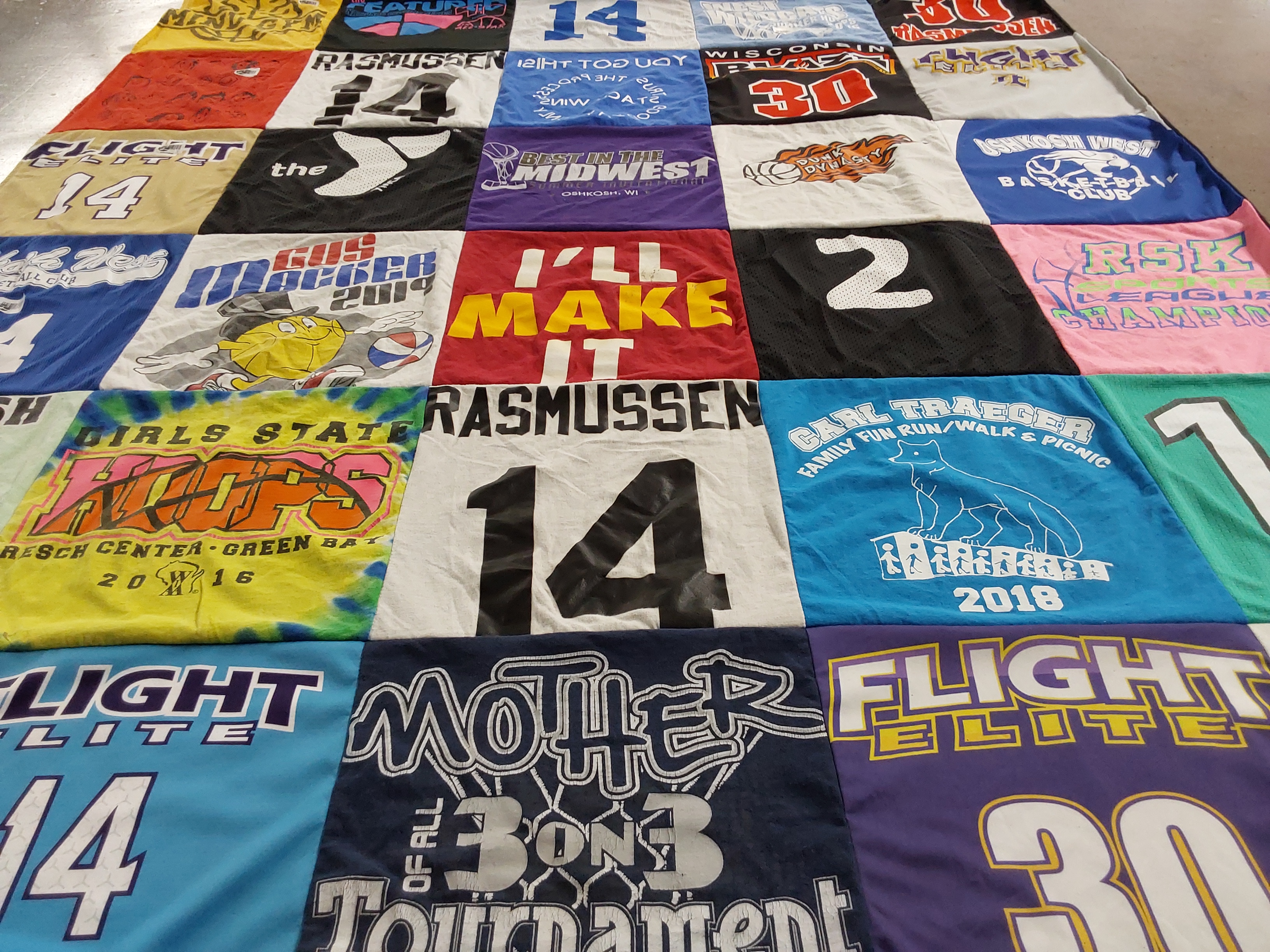 T-shirt quilt featuring flight elite basketball team by Karyn from WI