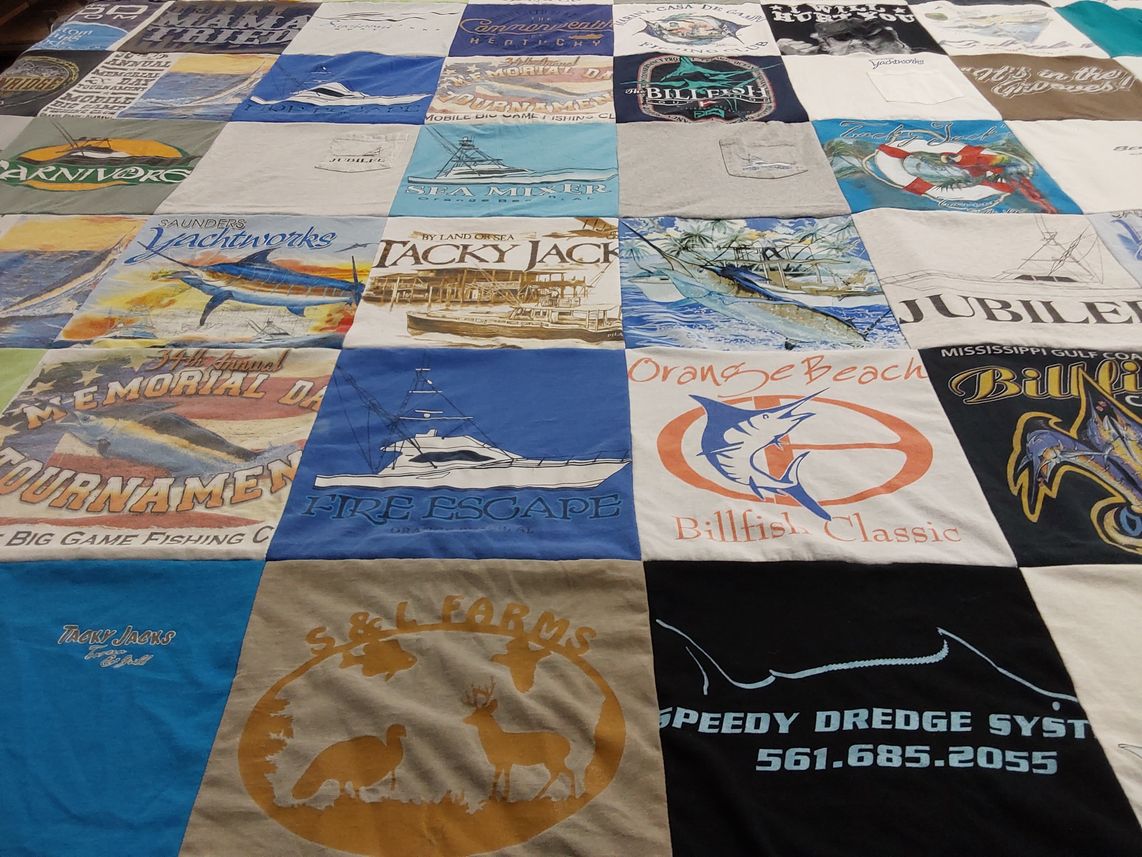 T-shirt quilt with fishing, boating themes by Deborah from AL