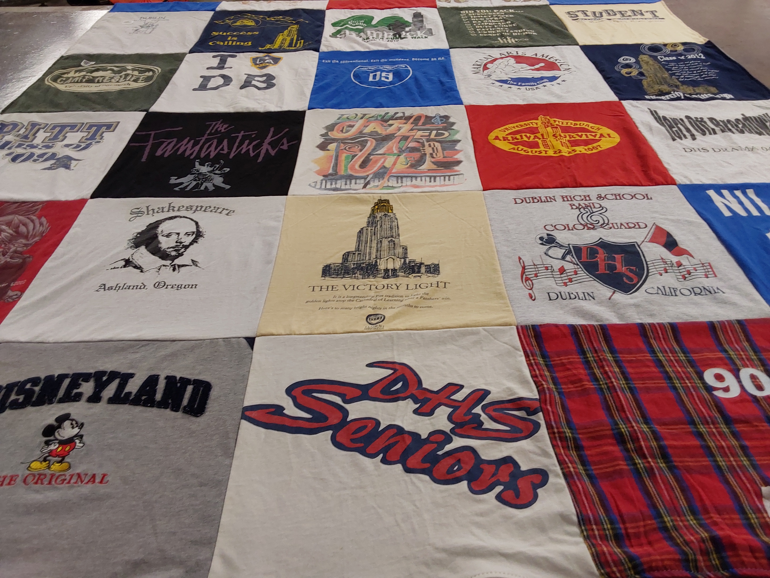 T-shirt quilt featuring dublin high school band colorguard by Caroline from TX