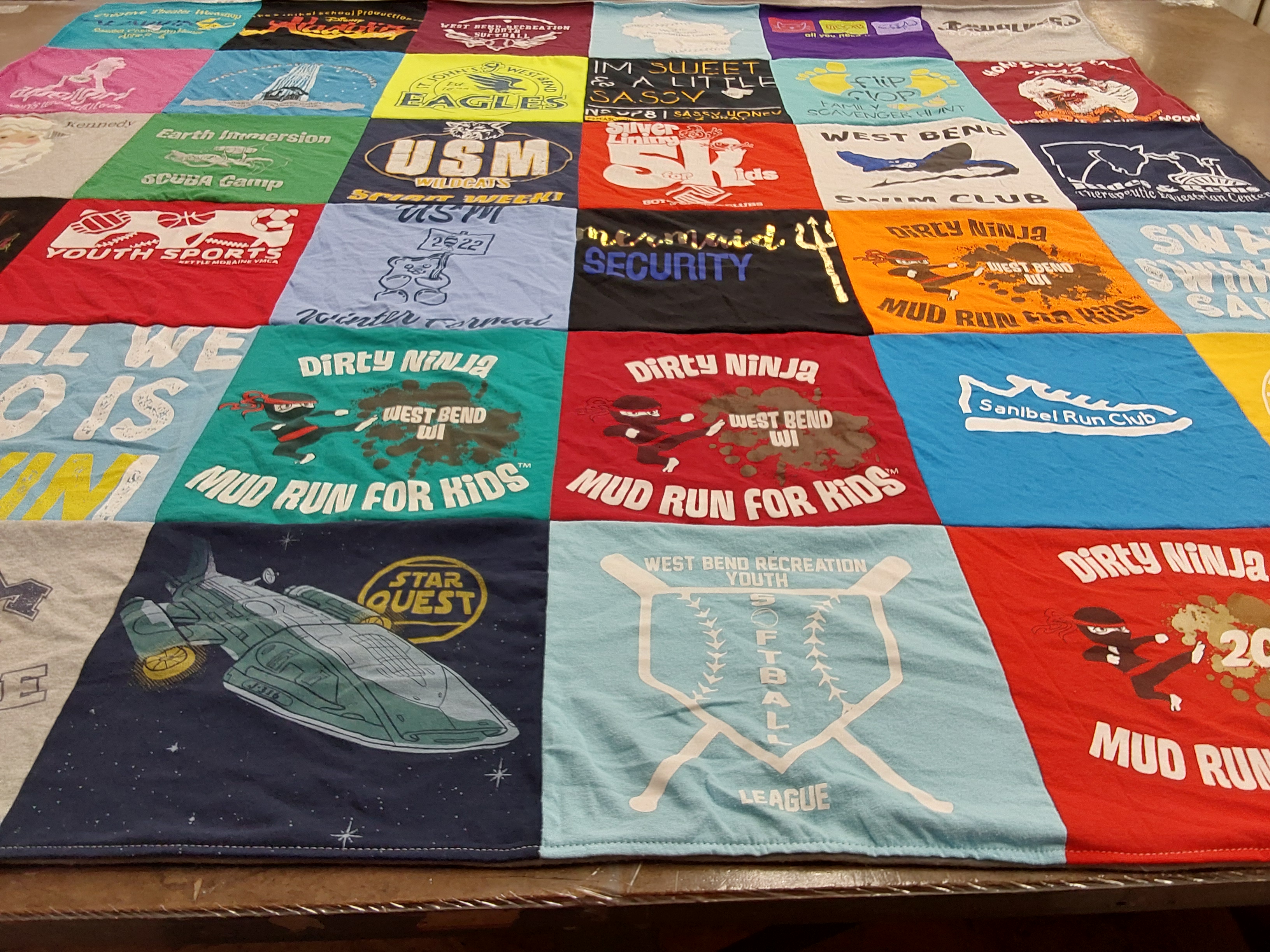 T-shirt quilt featuring university school of milwaukee wildcats by Sherry from WI