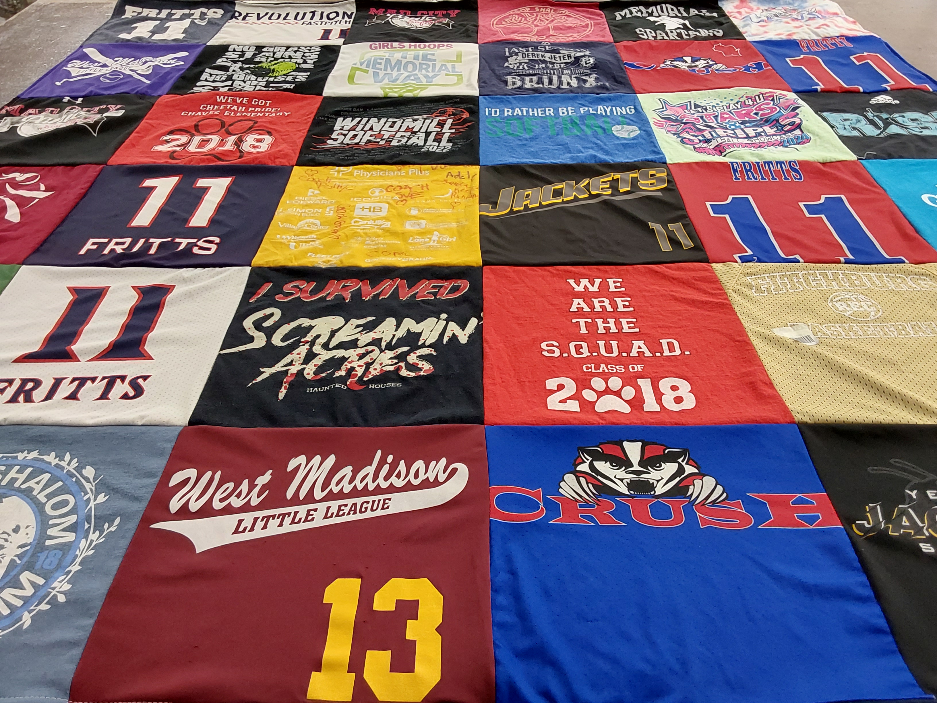 T-shirt quilt with sports, softball themes by Sue from WI