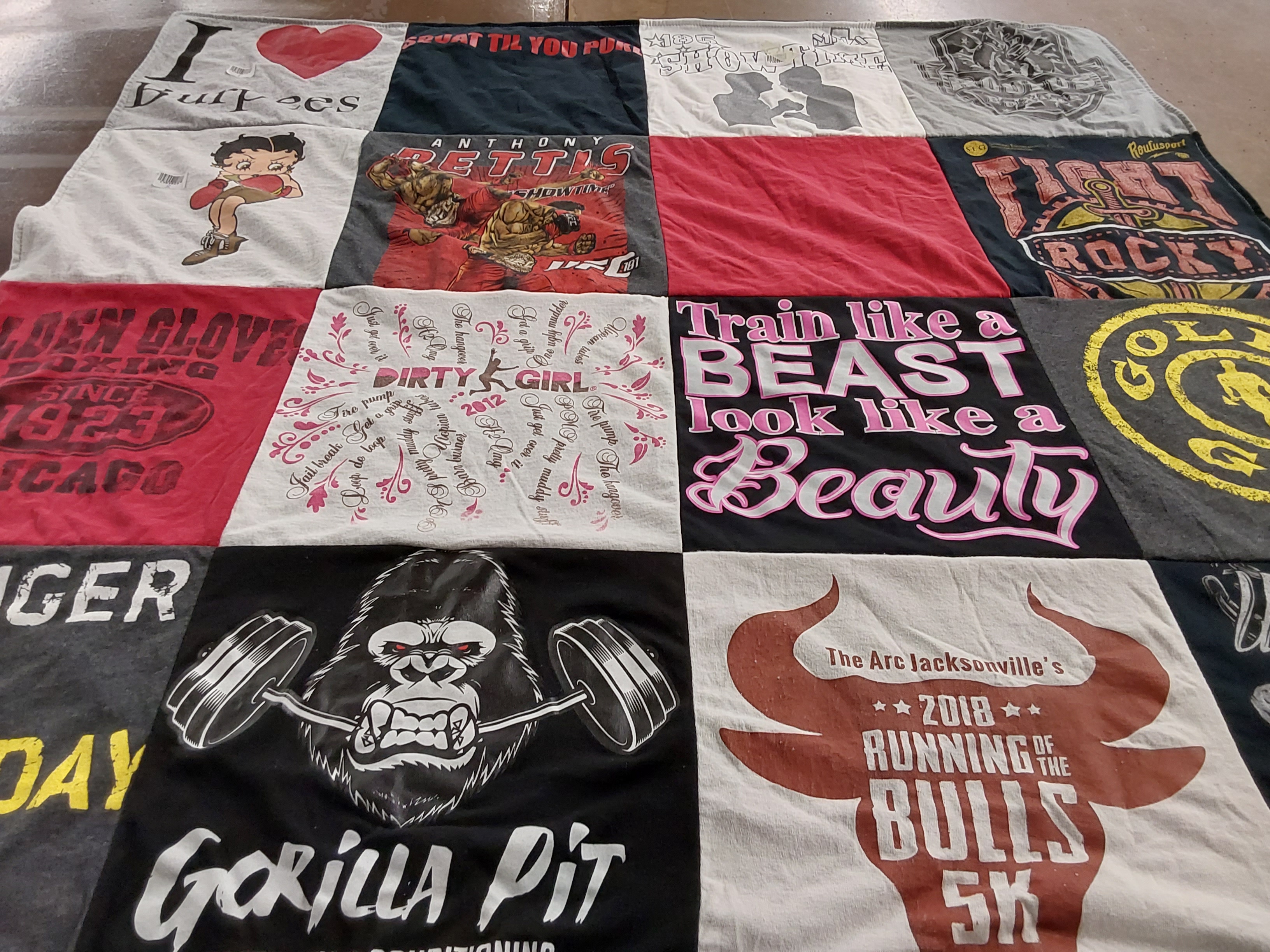 T-shirt quilt with fitness, boxing themes by Laura  from FL
