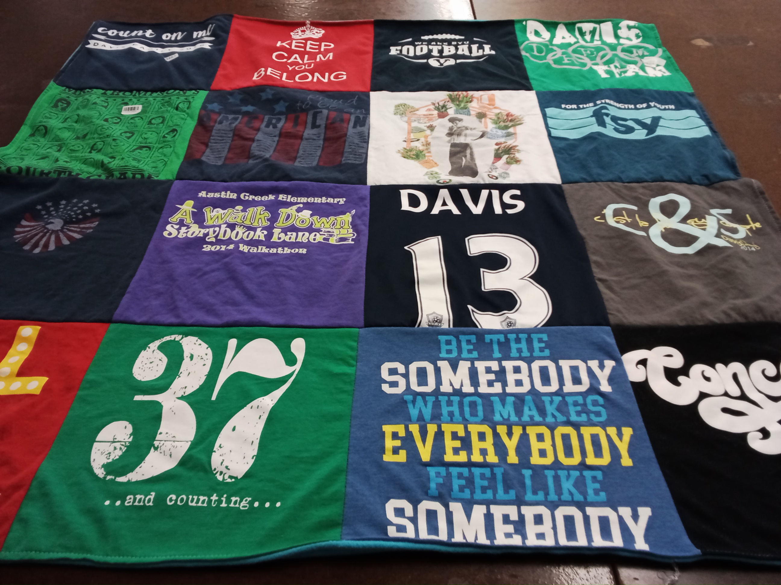 T-shirt quilt with community, sports themes by Jacey from UT