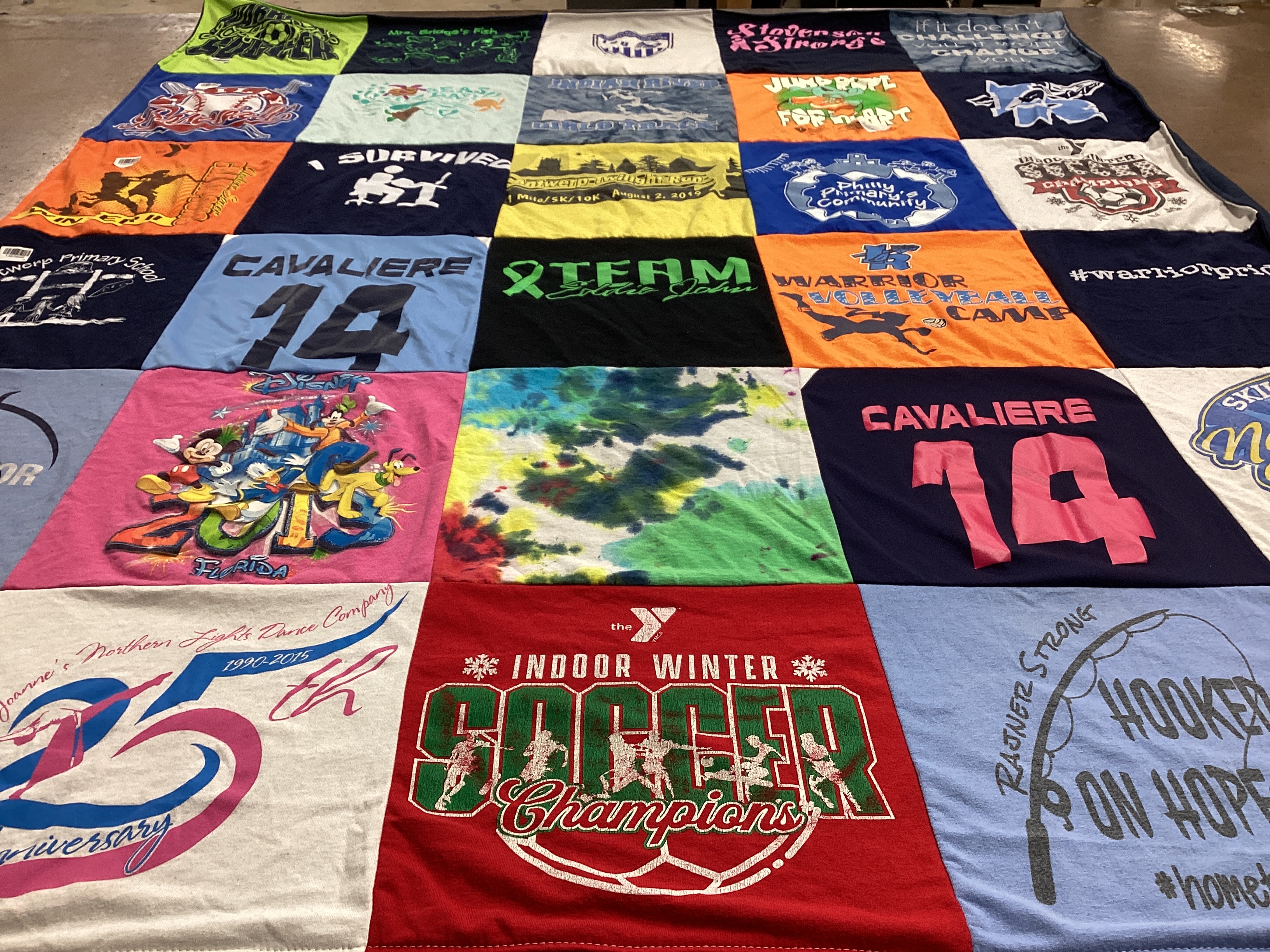 T-shirt quilt featuring warrior volleyball camp by Brianna from NY