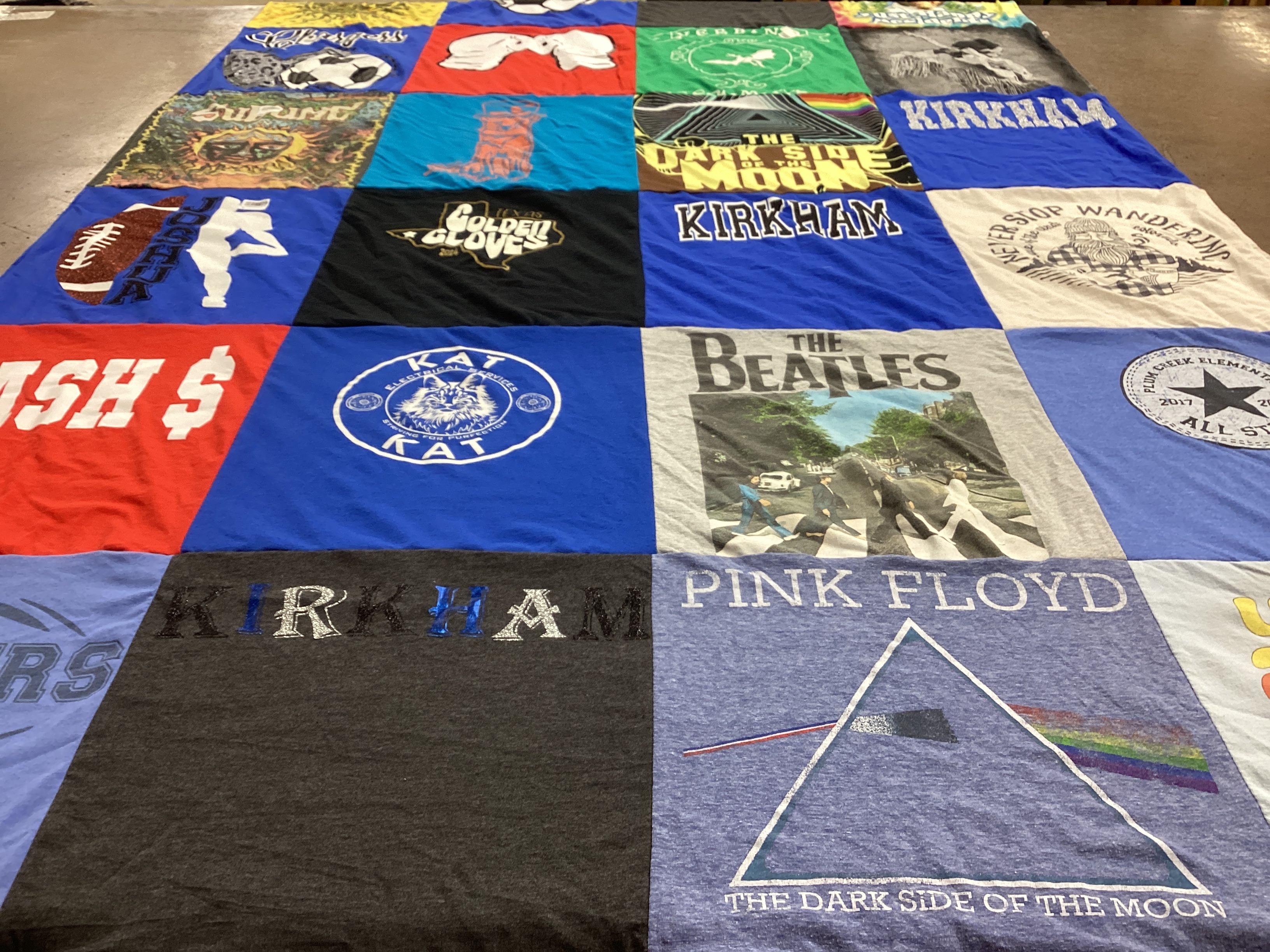 T-shirt quilt with music, sports themes by Kendra from TX
