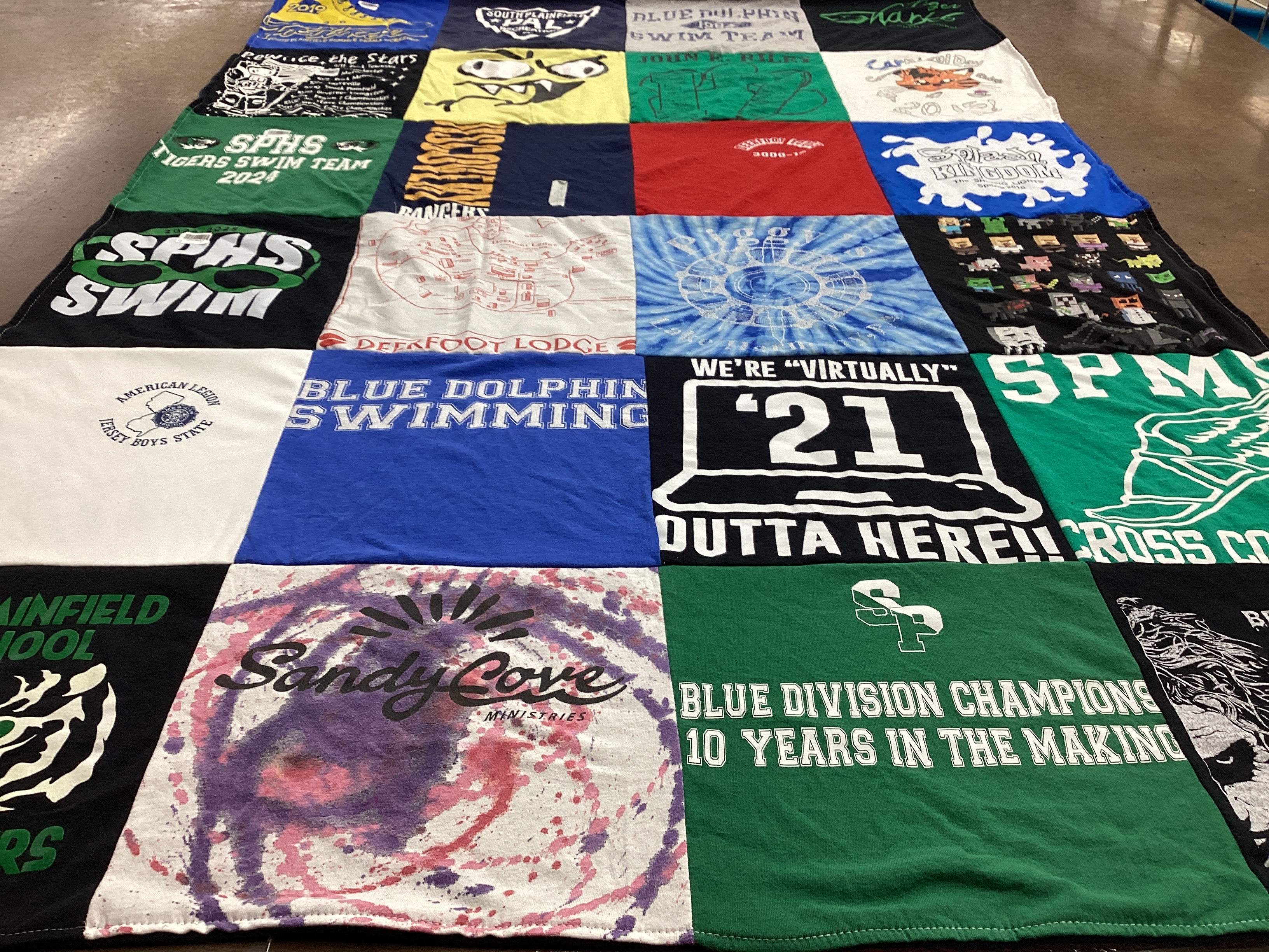T-shirt quilt featuring sparta high school swim team, blue dolphin swimming by Crystal from NJ