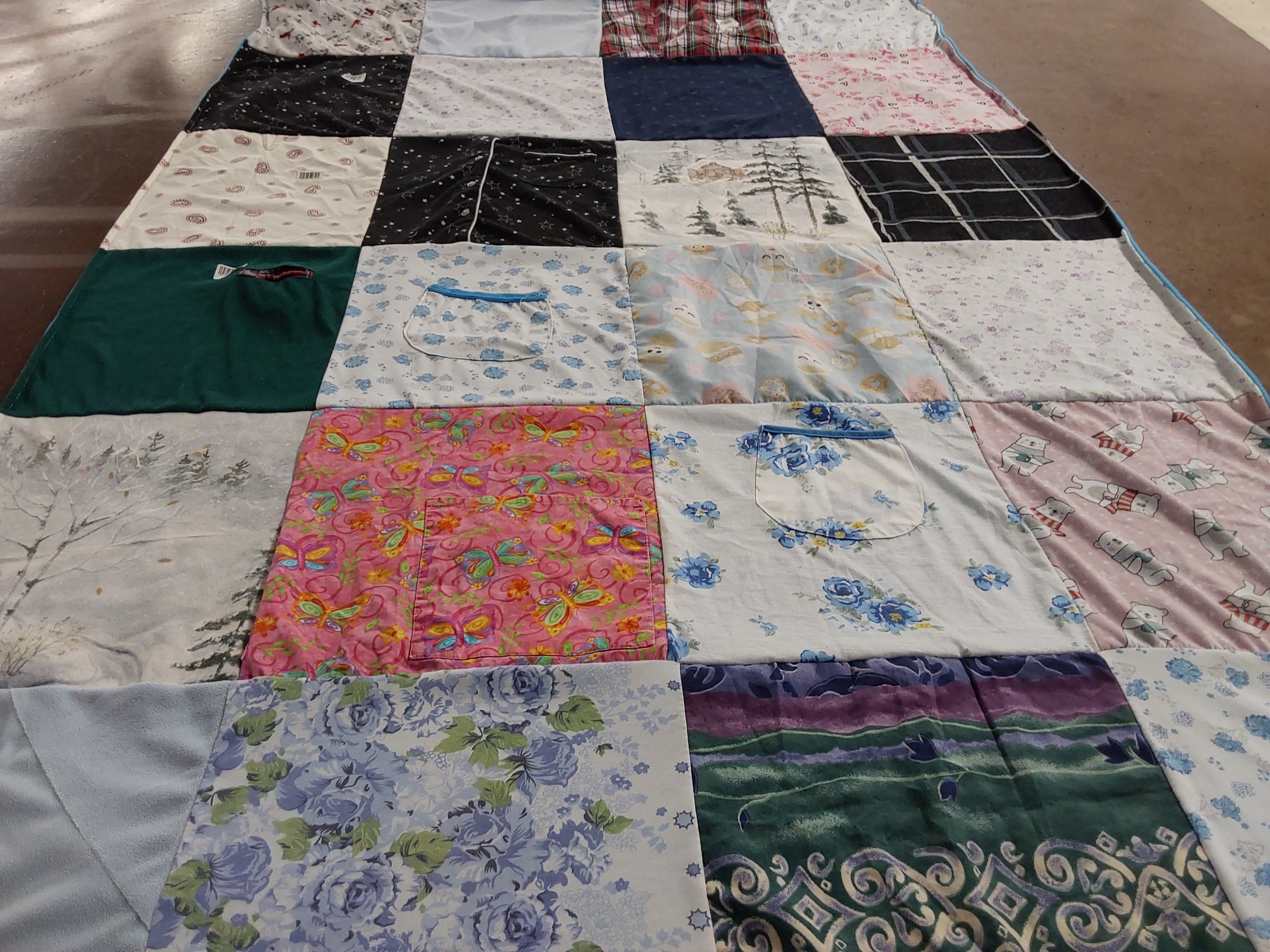 T-shirt quilt with nature, gardening themes by JULIE from MD