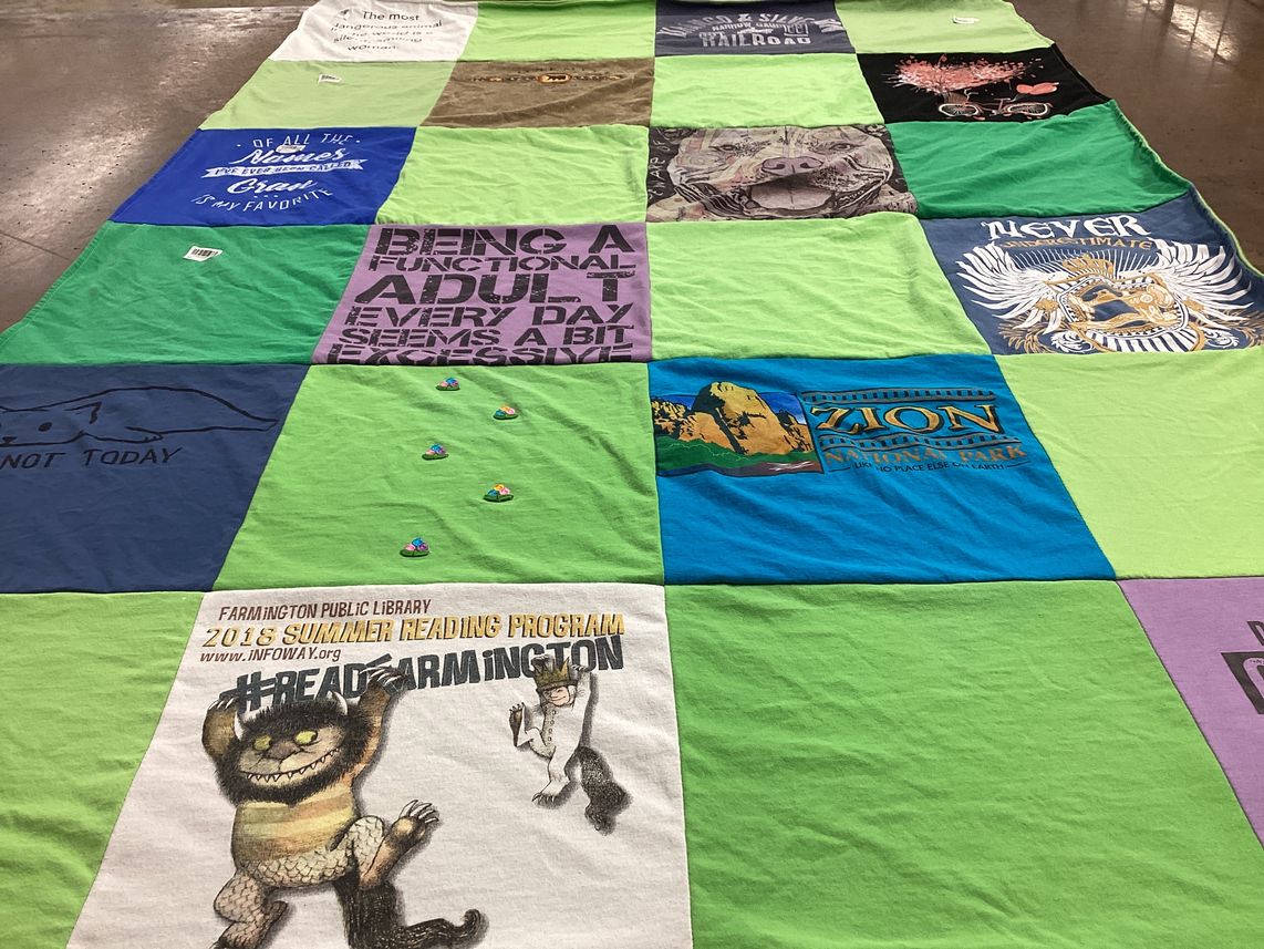 T-shirt quilt with reading, nature themes by Paula from CO