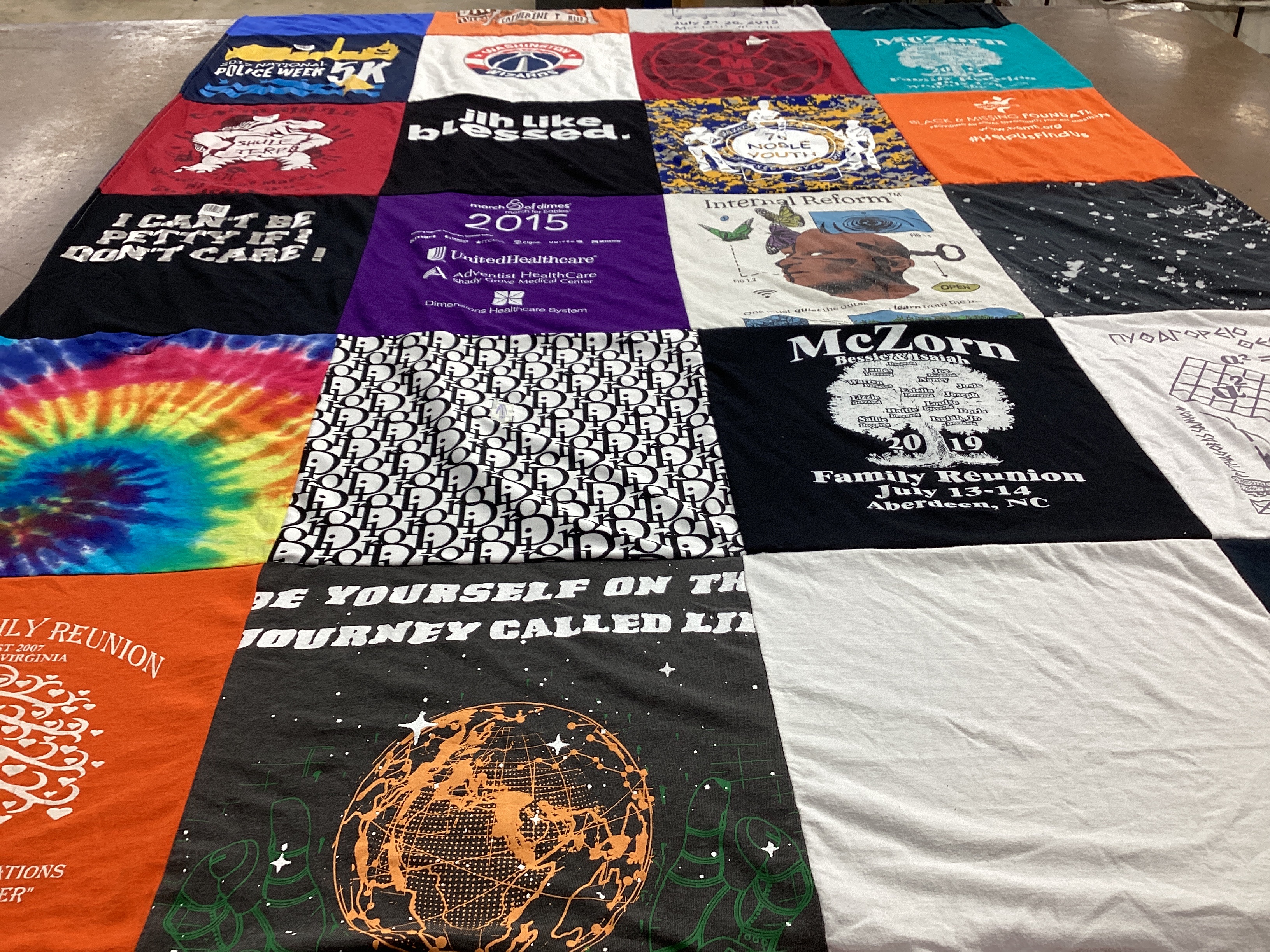 T-shirt quilt with family reunions, healthcare themes by Pamela from MD