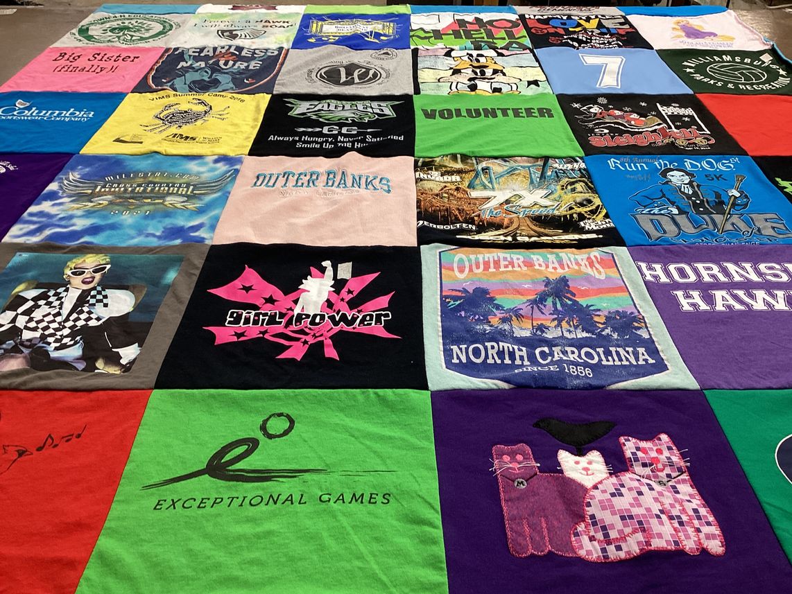 T-shirt quilt with outdoor activities, volunteering themes by Angela from VA