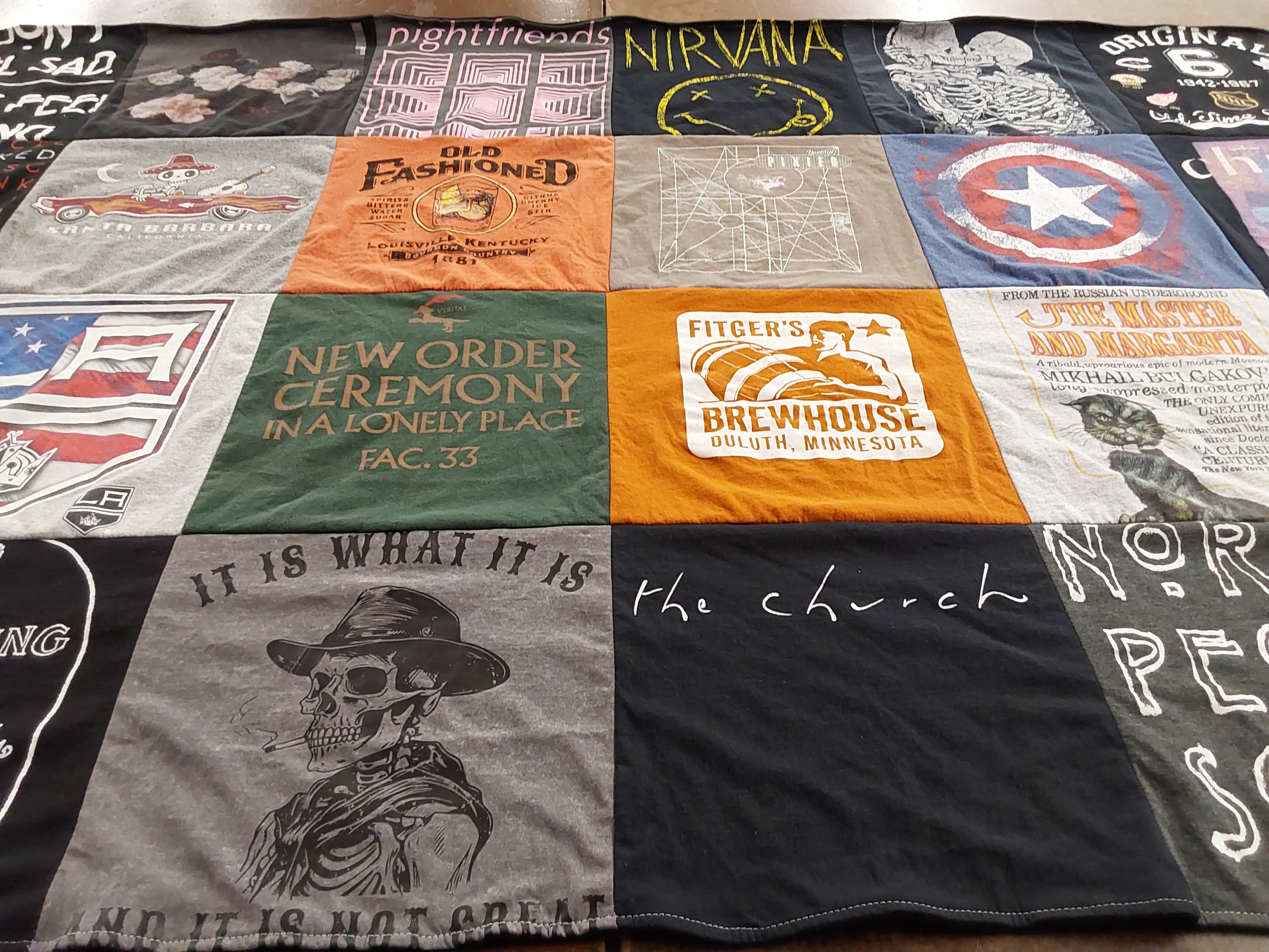 T-shirt quilt with music, craft beer themes by T Joseph from CA