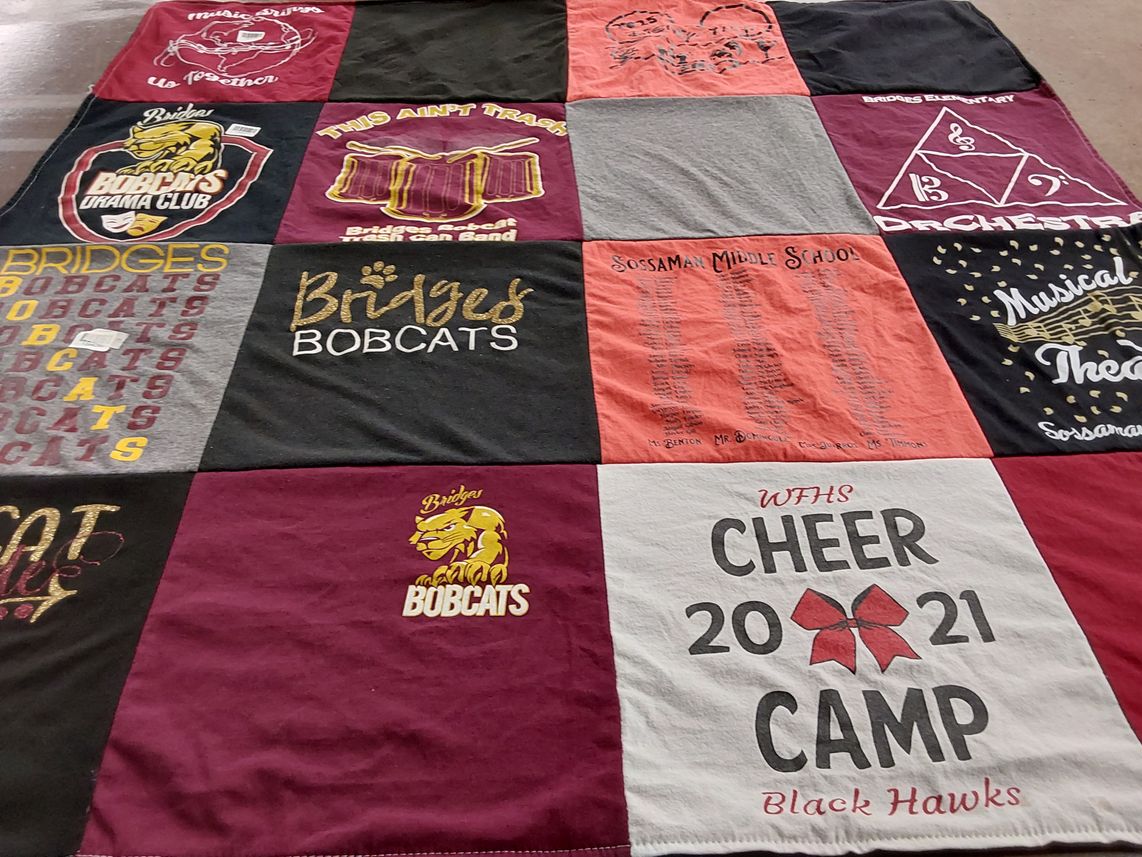 T-shirt quilt featuring black hawks cheer team by kristen from AZ