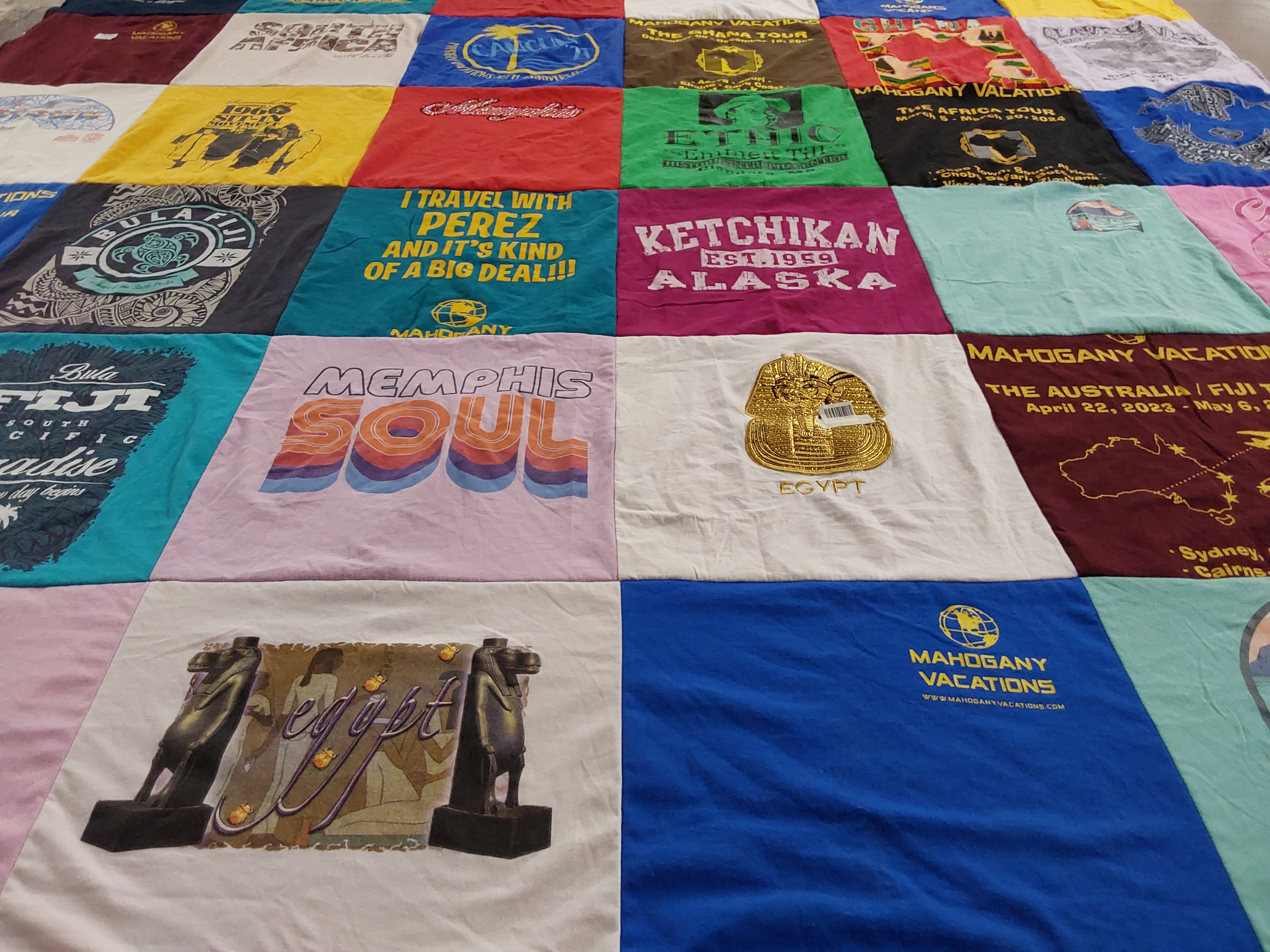 T-shirt quilt with travel, vacations themes by Arelia from CA
