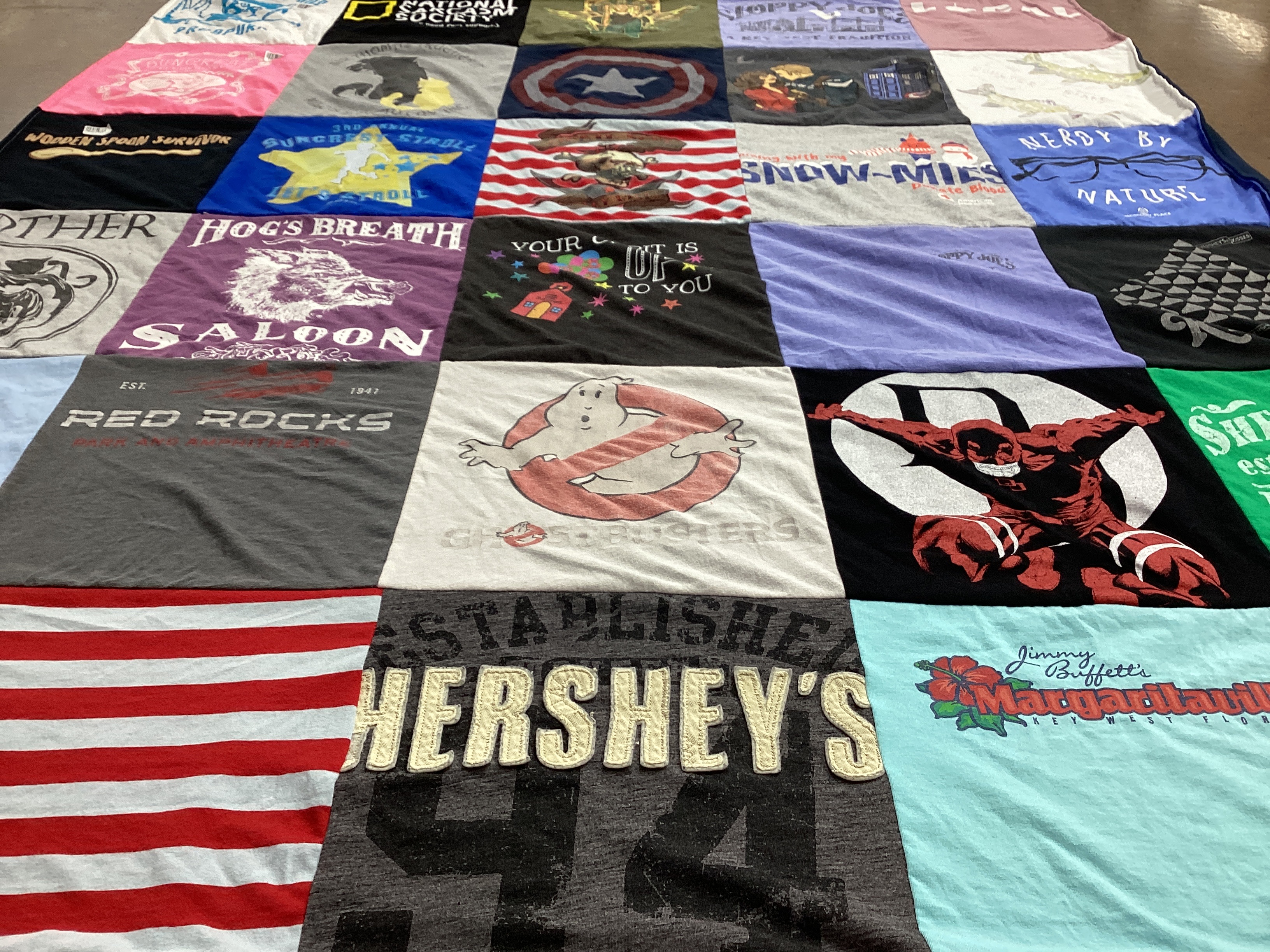 T-shirt quilt with movies, food themes by Amy from WV