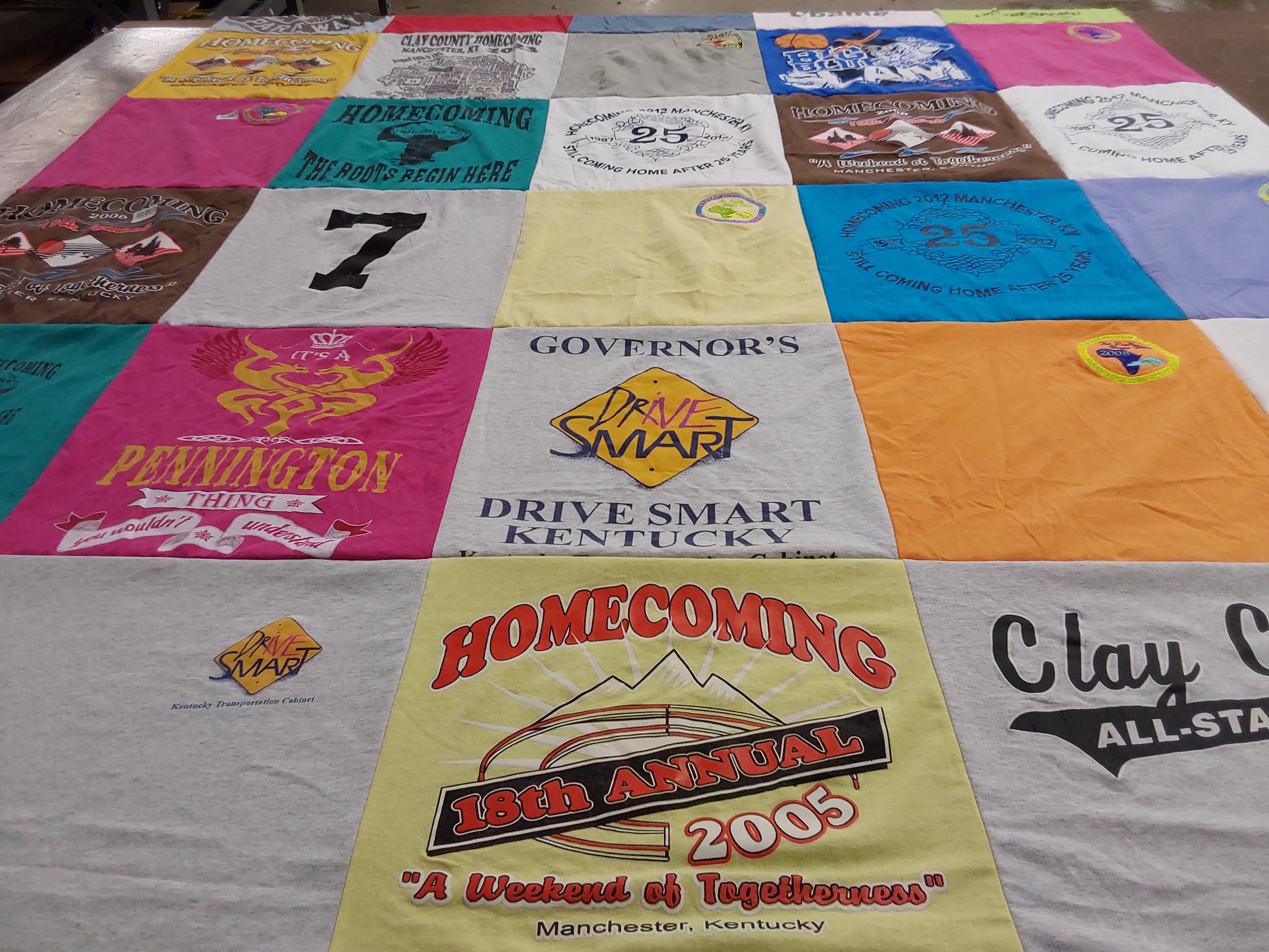 T-shirt quilt with community events, local traditions themes by Tammy from KY