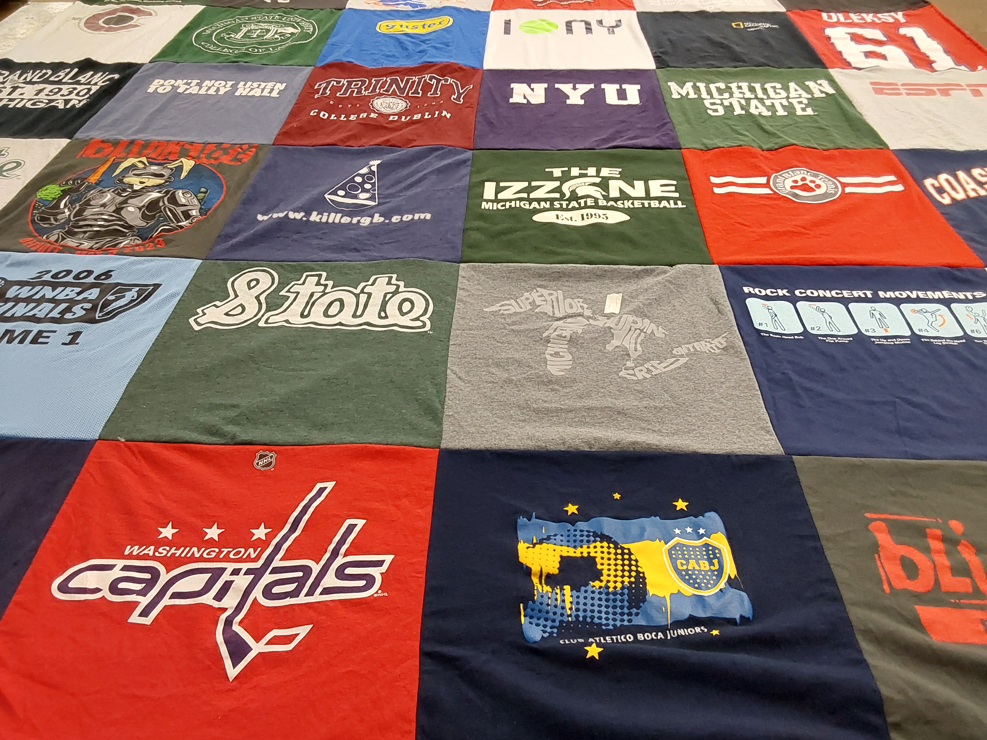 T-shirt quilt featuring michigan state university, washington capitals by Stephanie from MI