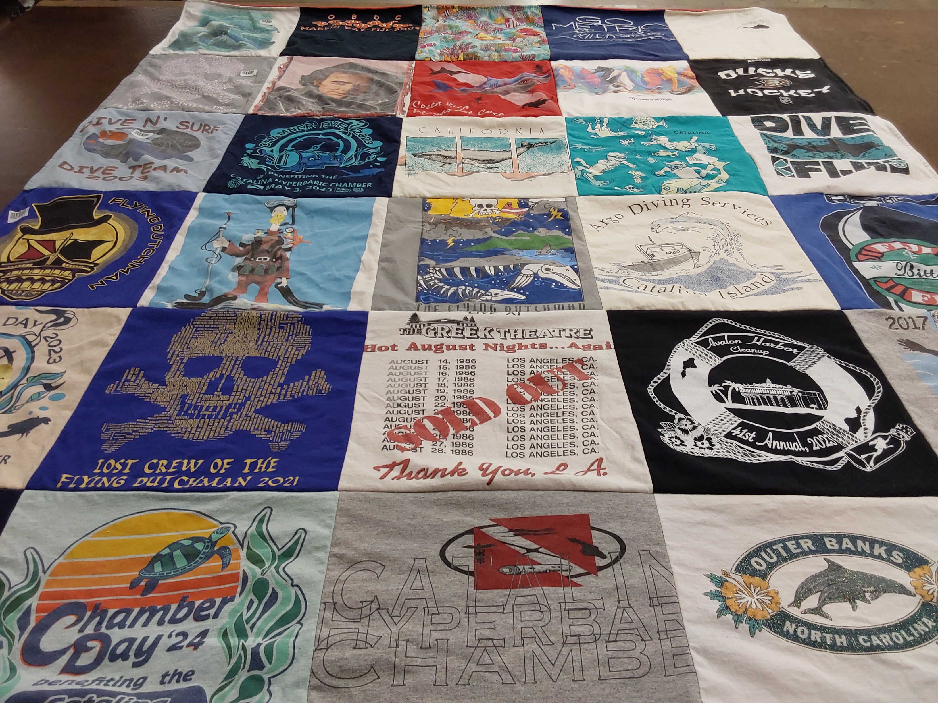 T-shirt quilt with diving, surfing themes by mary from CA