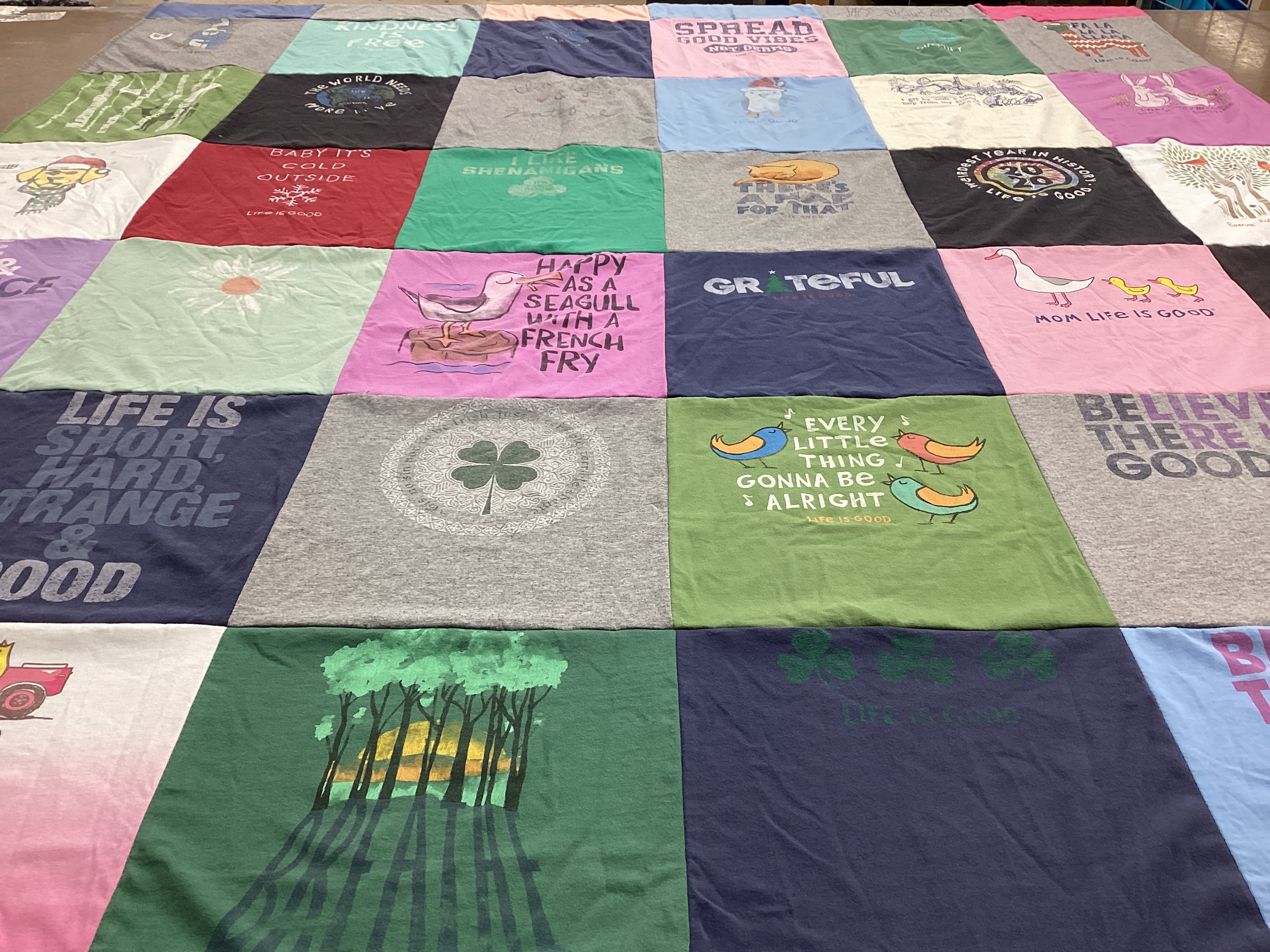 T-shirt quilt with positivity, happiness themes by Juliette from CT