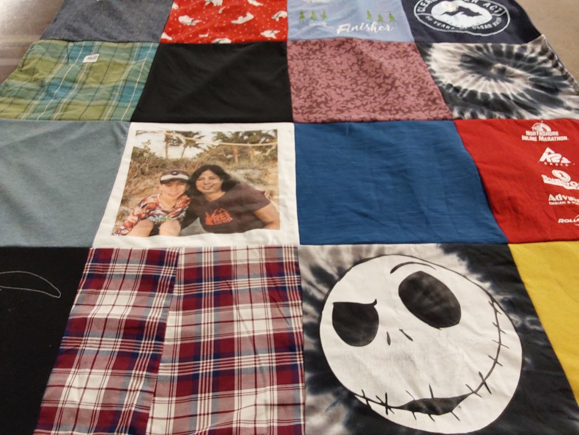 T-shirt quilt with hiking, running themes by Denise from MN
