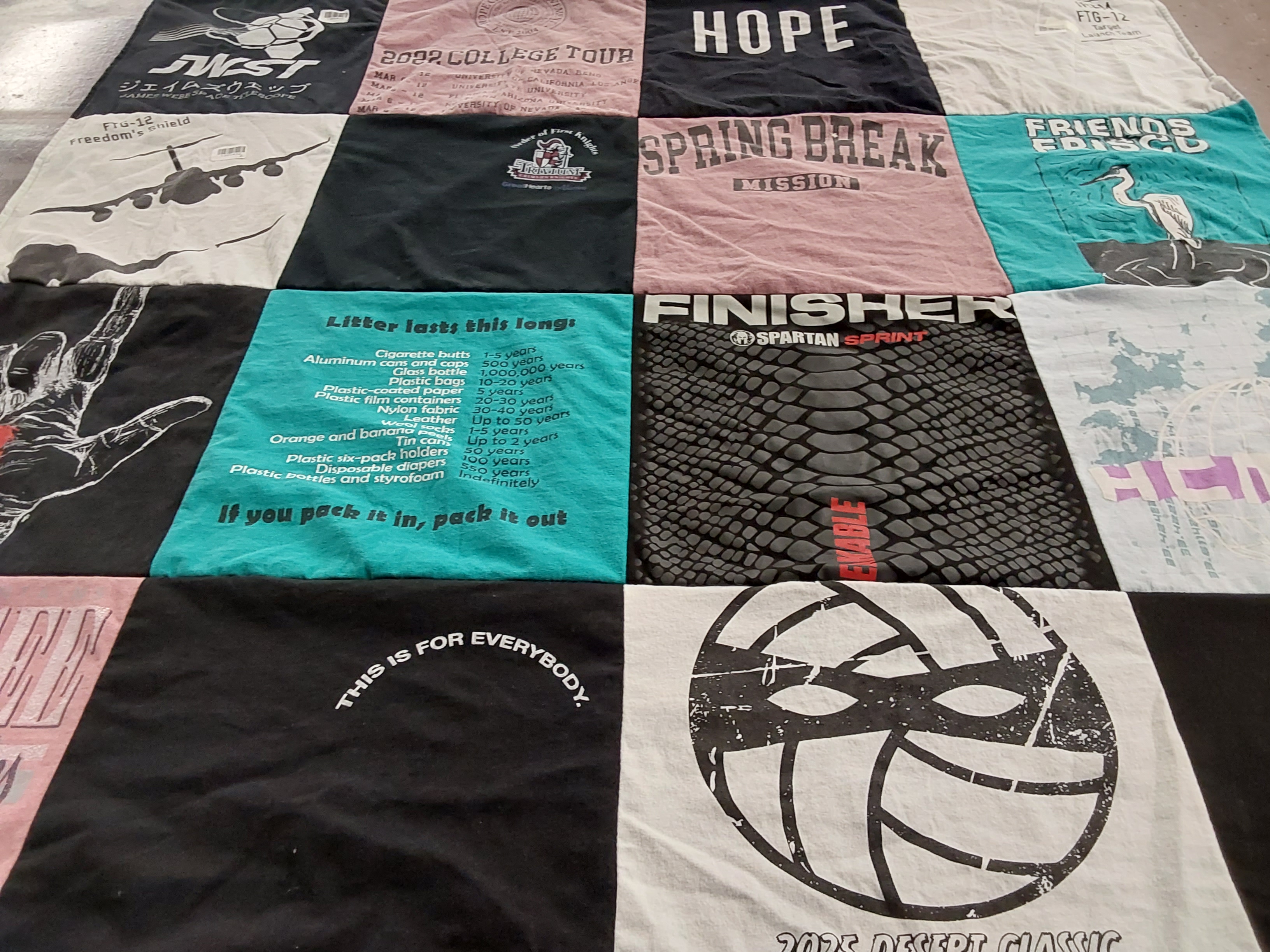 T-shirt quilt with environmental awareness, outdoor activities themes by Olivia from AZ