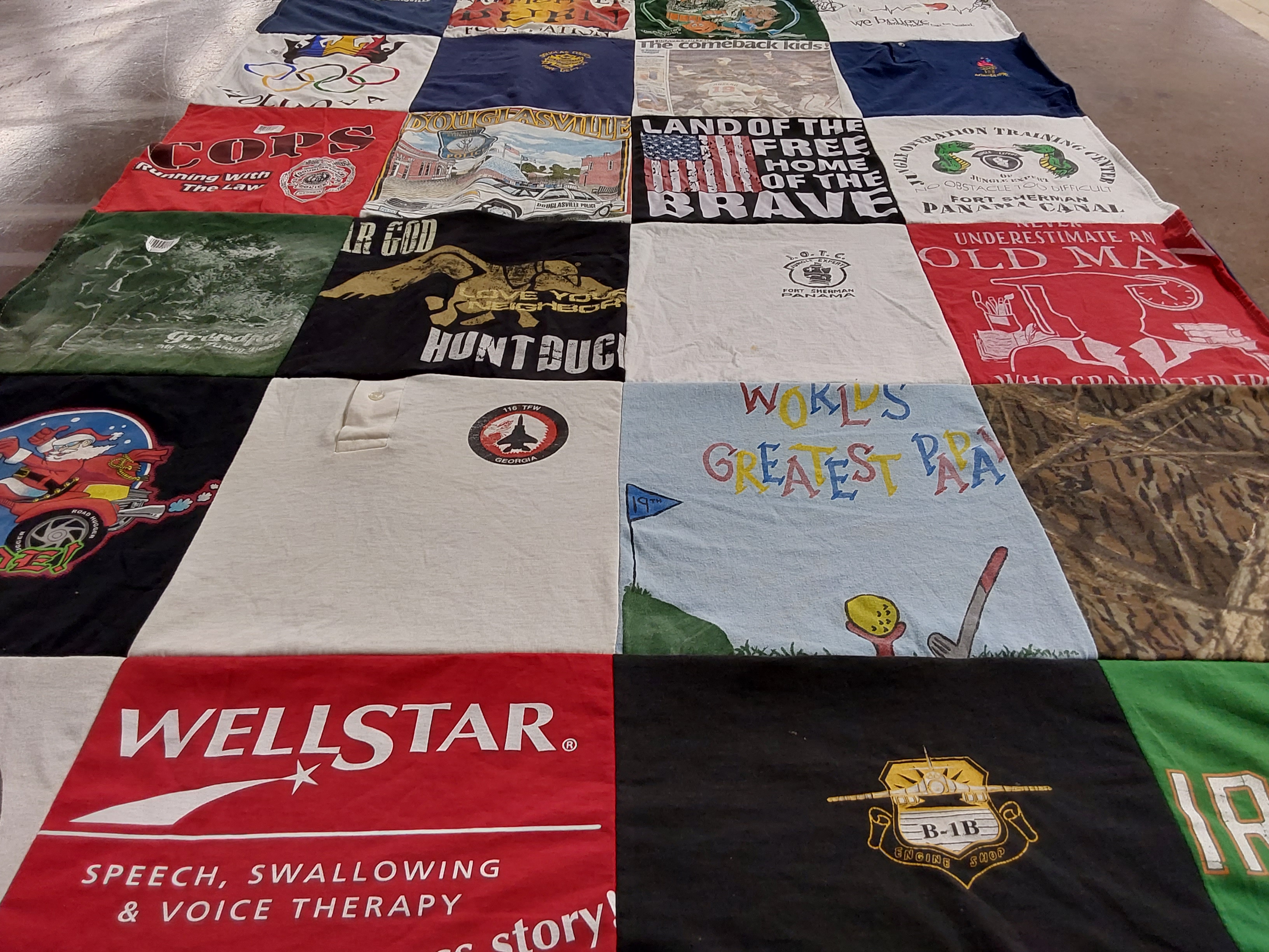 T-shirt quilt with hunting, law enforcement themes by Sara from GA