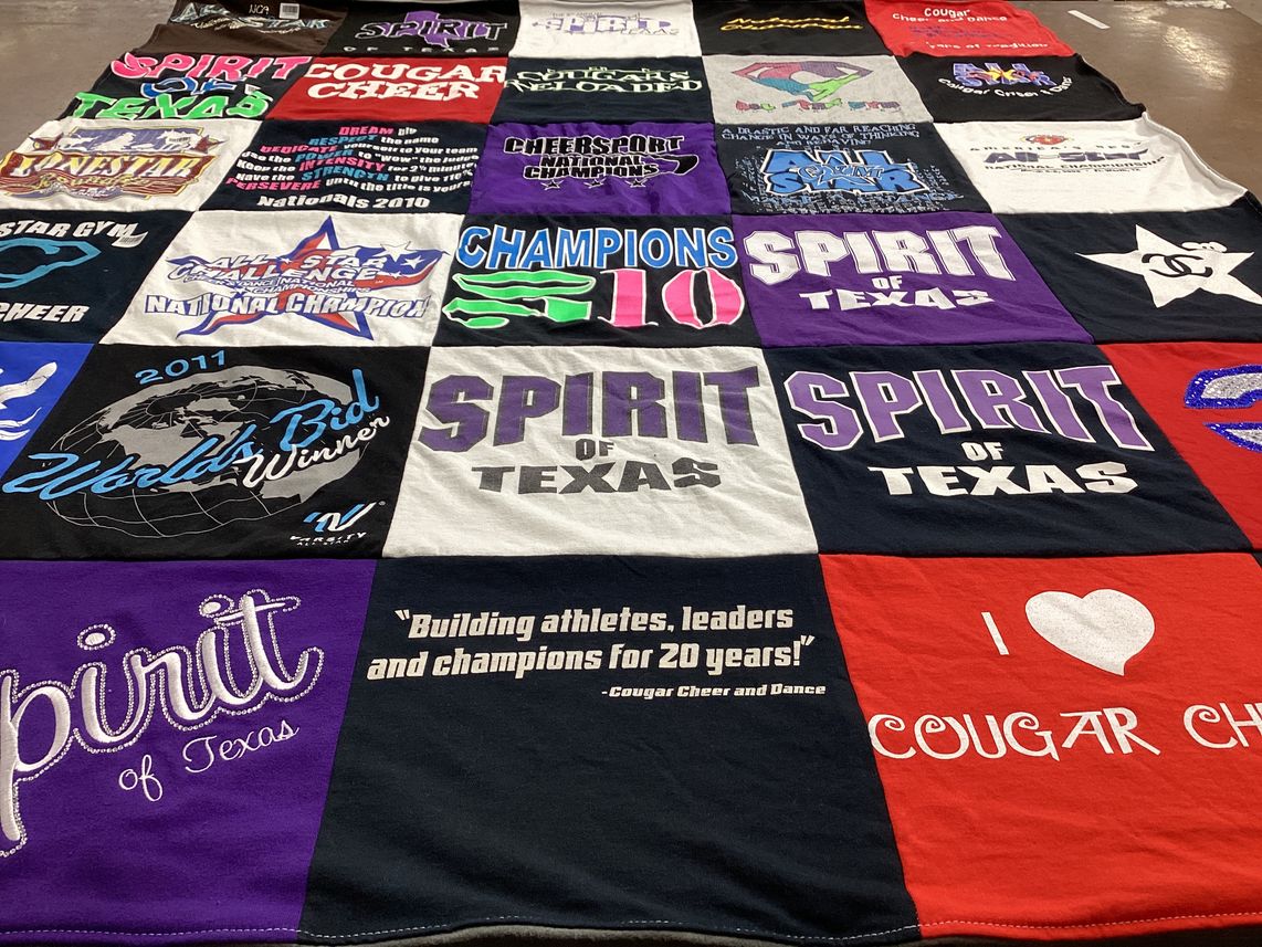 T-shirt quilt with cheerleading, dance themes by Kaitlin from TX