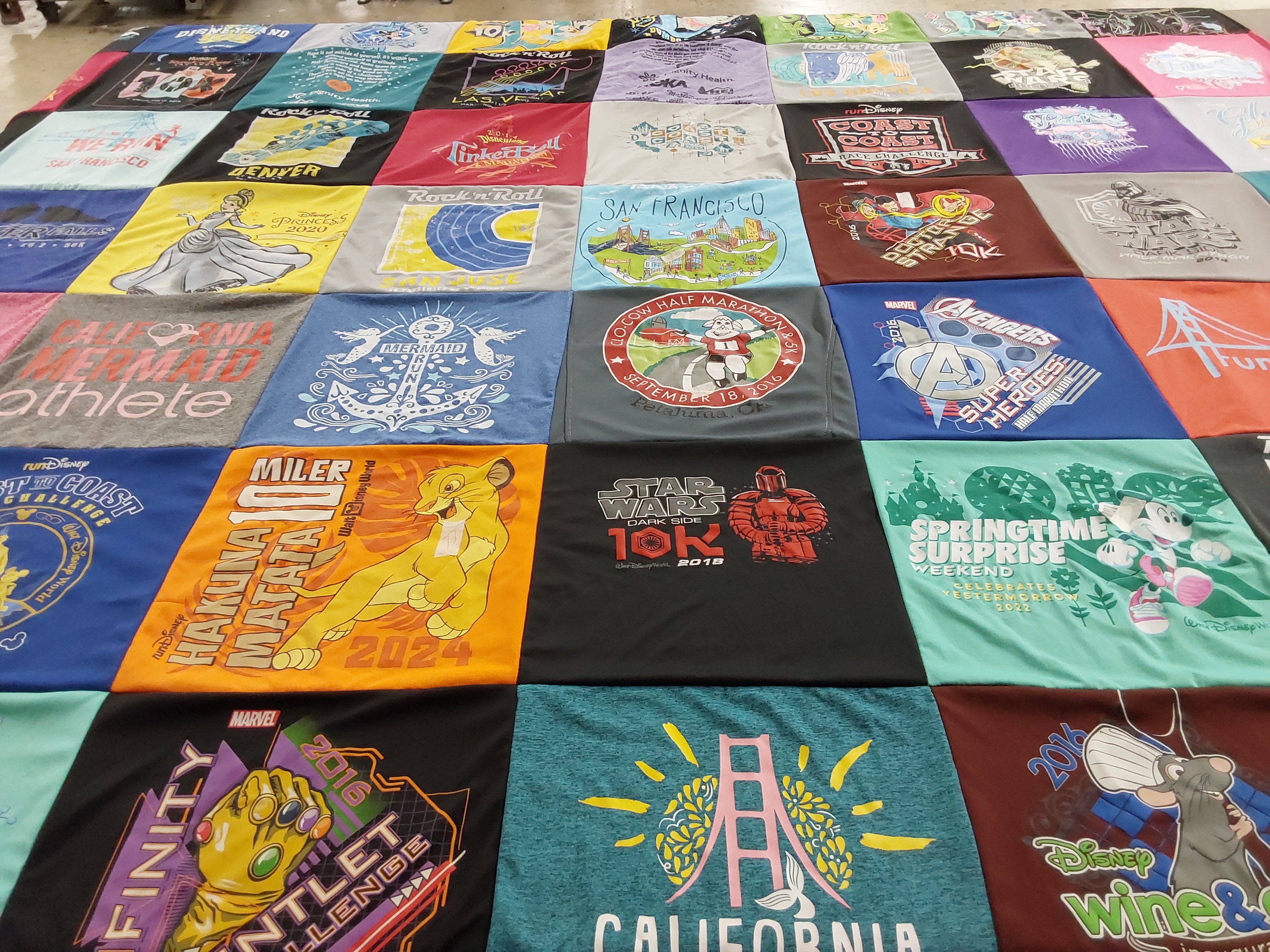 T-shirt quilt with running, disney themes by DEBBIE from CA