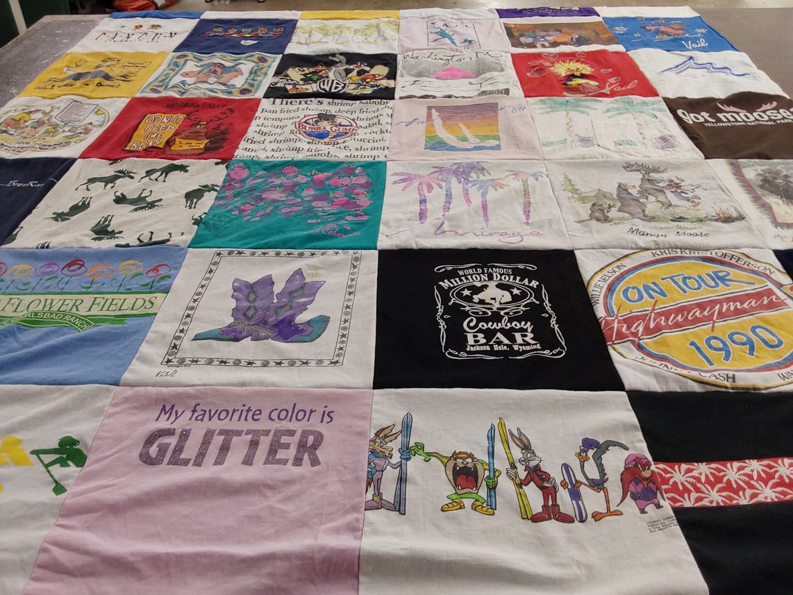 T-shirt quilt with art, travel themes by Kathleen from CA