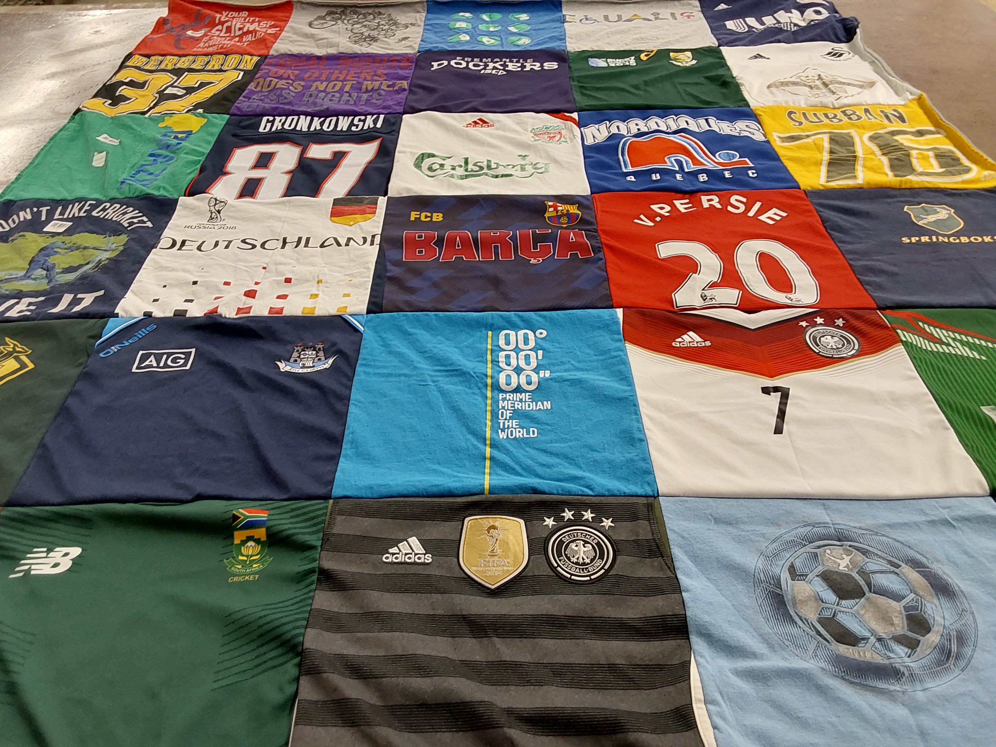 T-shirt quilt featuring german national soccer team, south african national cricket team by Tracy from MA