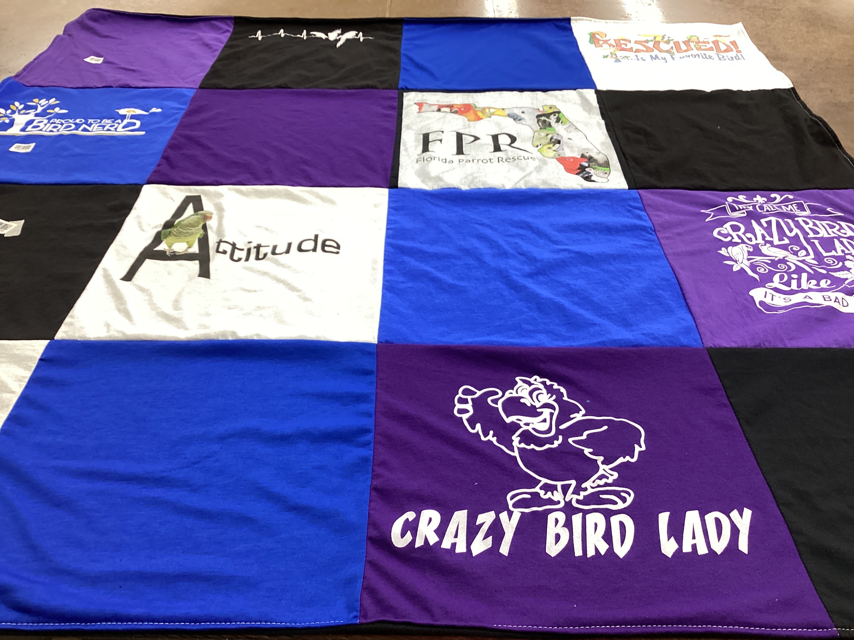T-shirt quilt with birds, animal rescue themes by Nancy from FL