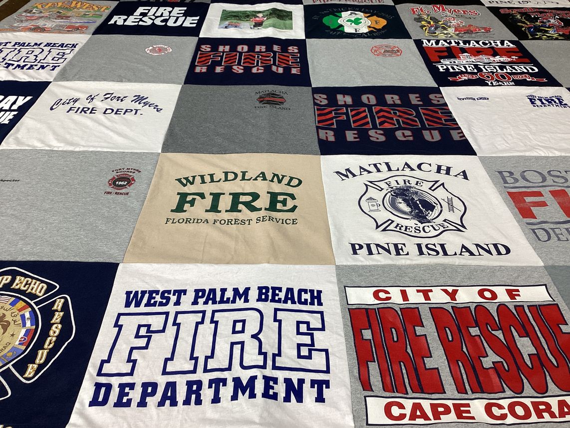 T-shirt quilt with emergency services, firefighting themes by Ernestine from FL