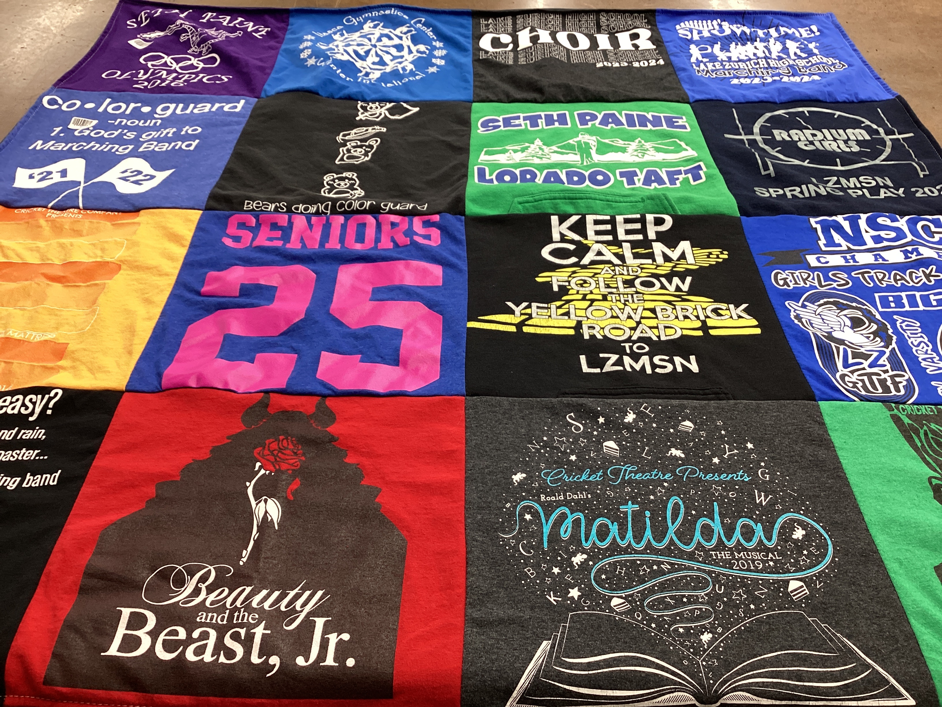 T-shirt quilt featuring girls track team by Lori from IL