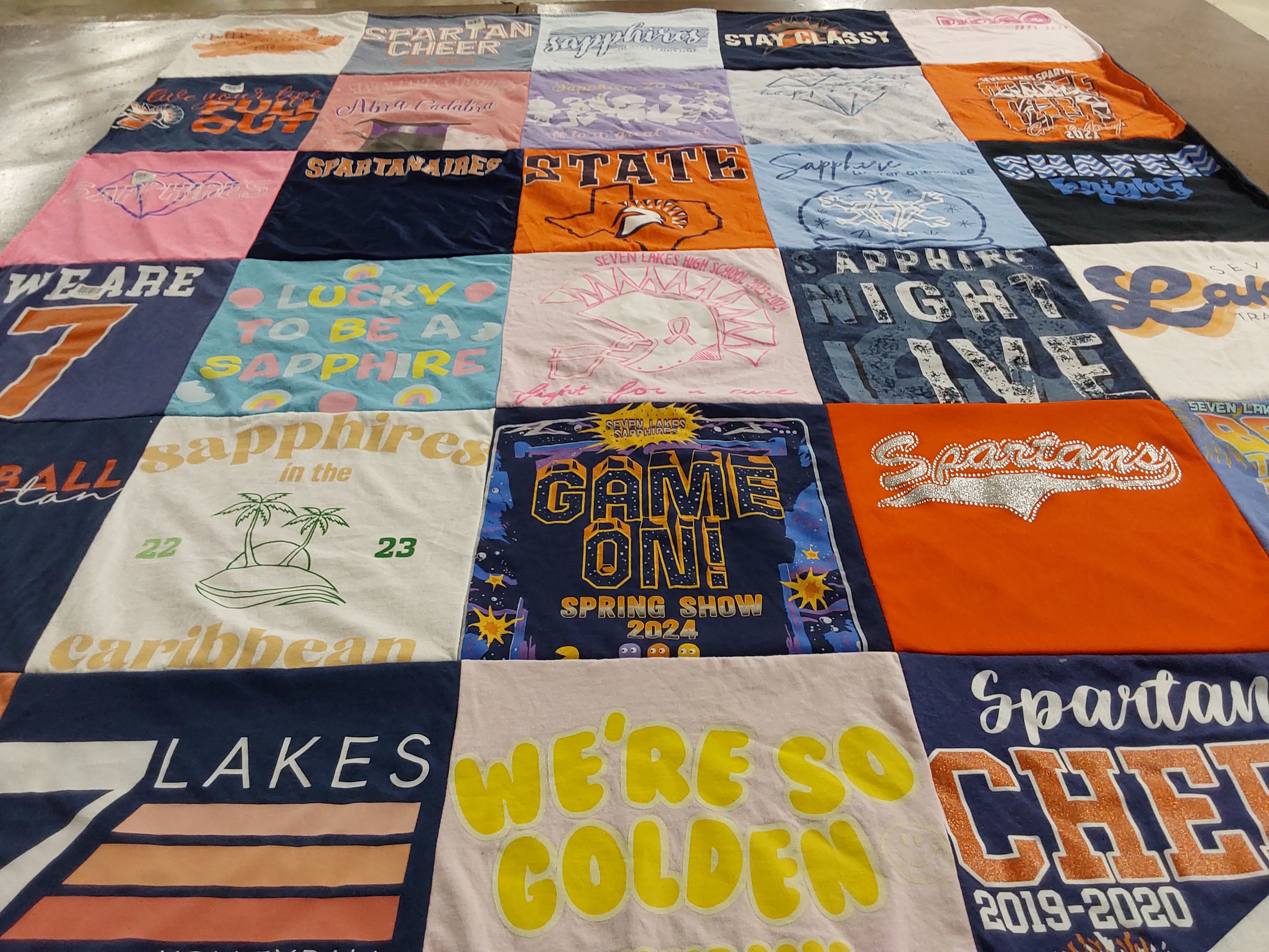 T-shirt quilt featuring seven lakes high school cheer team by Tammy from TX