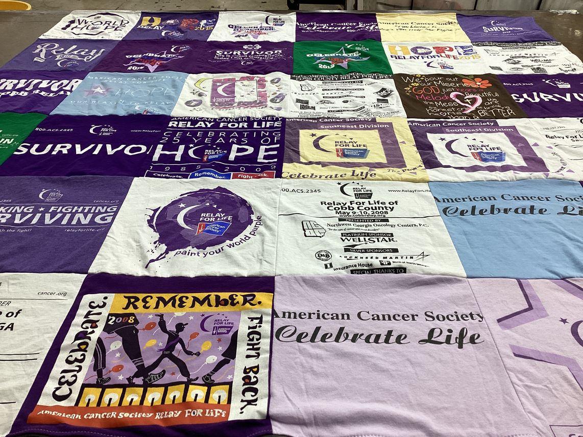 T-shirt quilt with cancer awareness, survivorship themes by Susan from GA