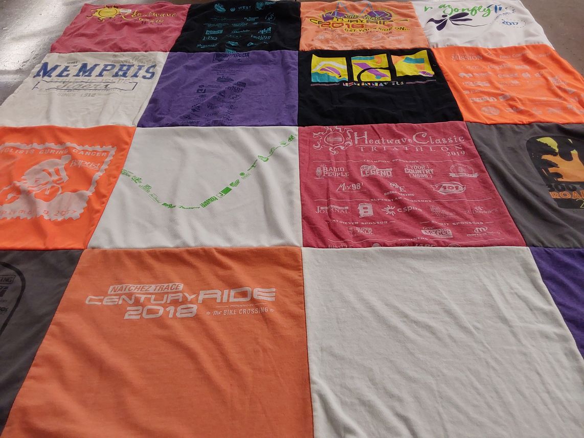 T-shirt quilt with cycling, triathlons themes by Gwendolyn from TN