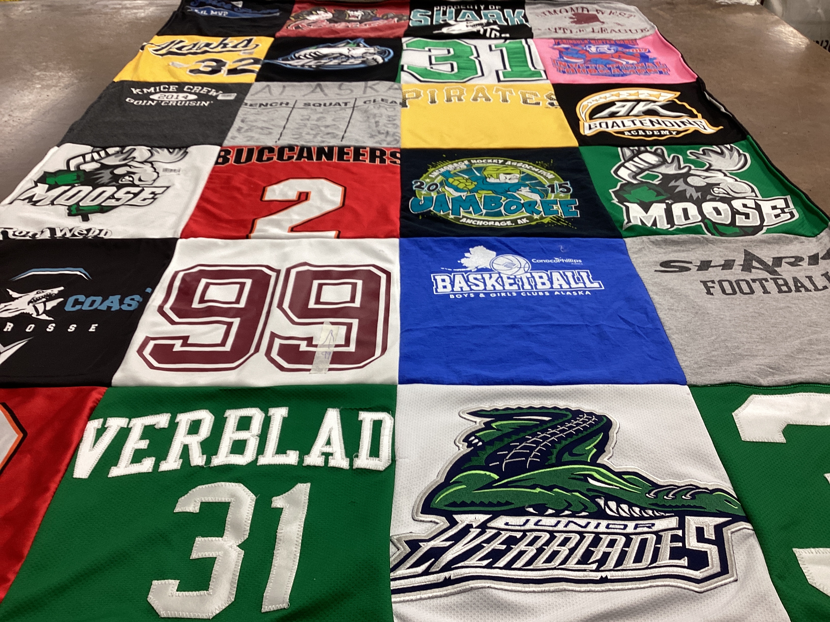 T-shirt quilt with basketball, hockey themes by Amanda from FL