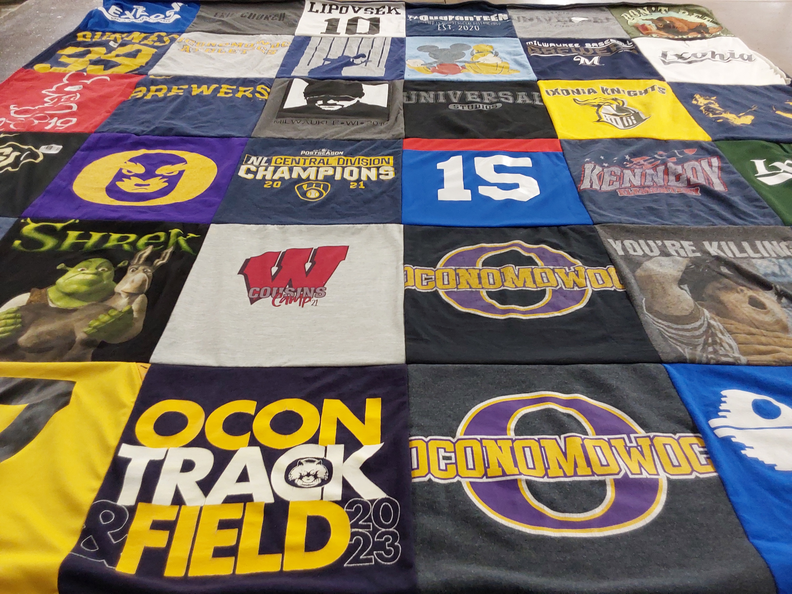 T-shirt quilt featuring oconomowoc high school track and field by Melissa from WI