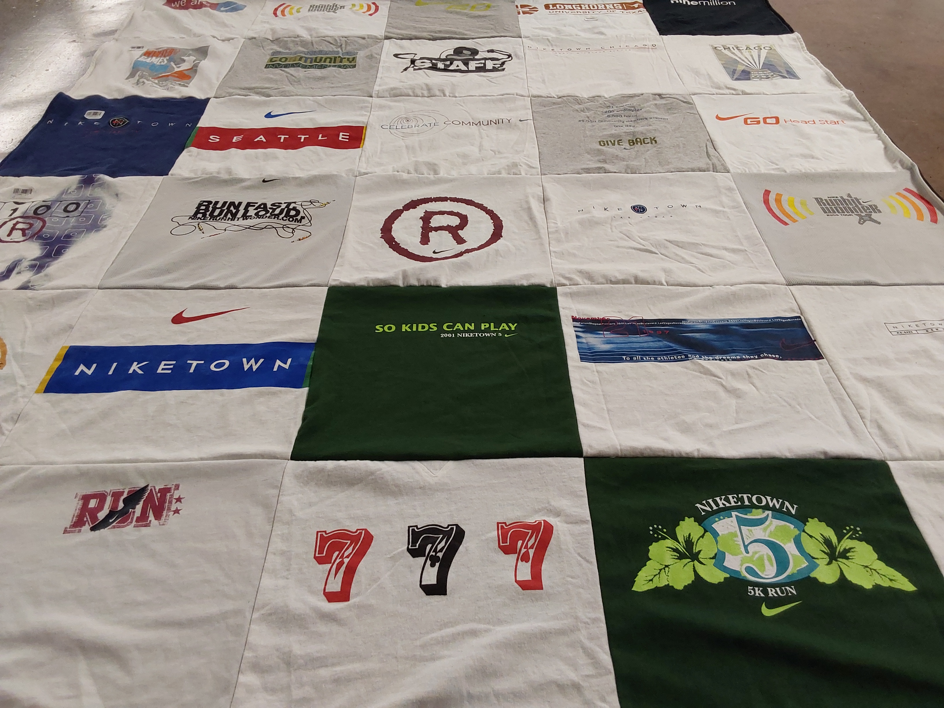 T-shirt quilt with running, community service themes by Judith from TX