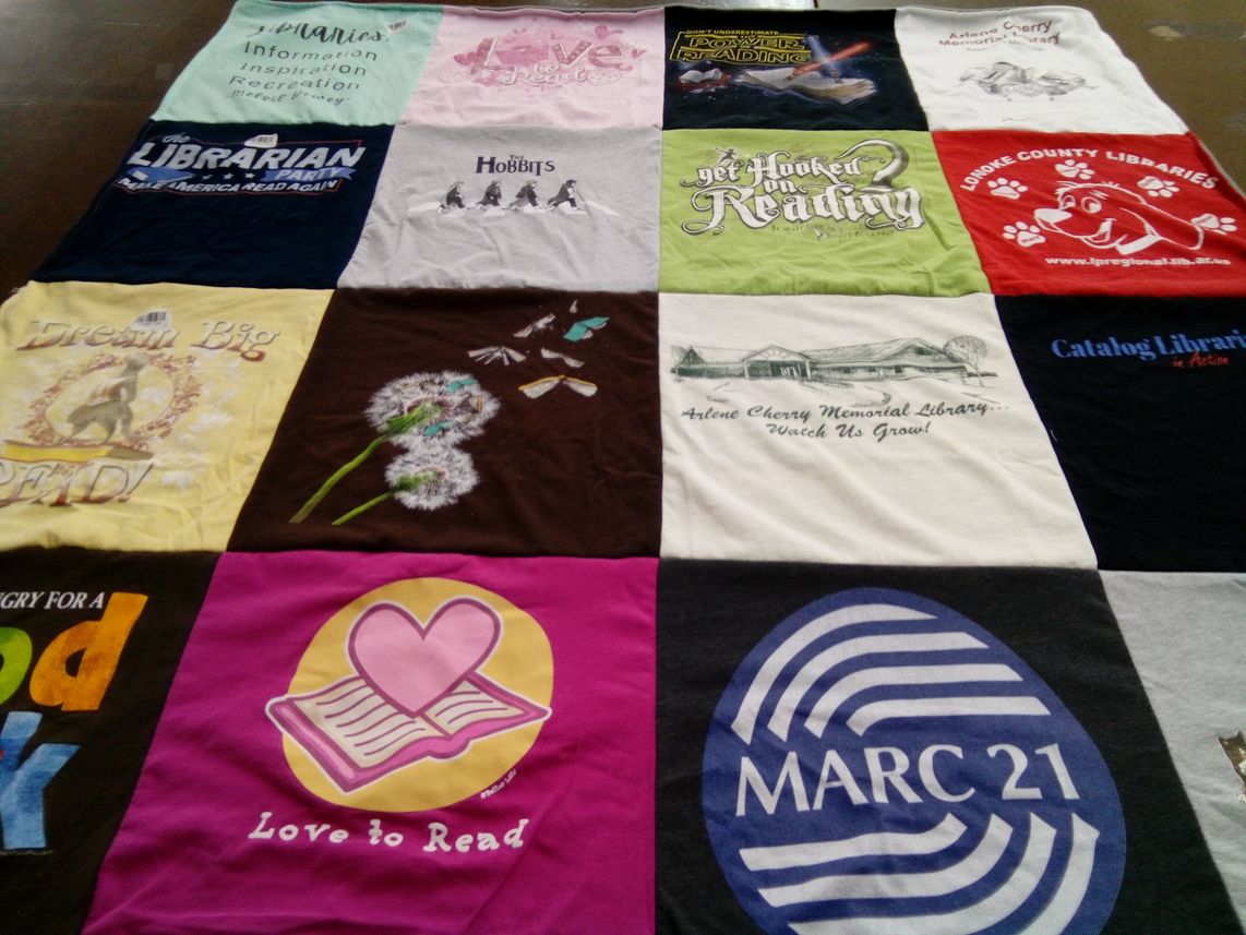T-shirt quilt with reading, libraries themes by Christine from AR
