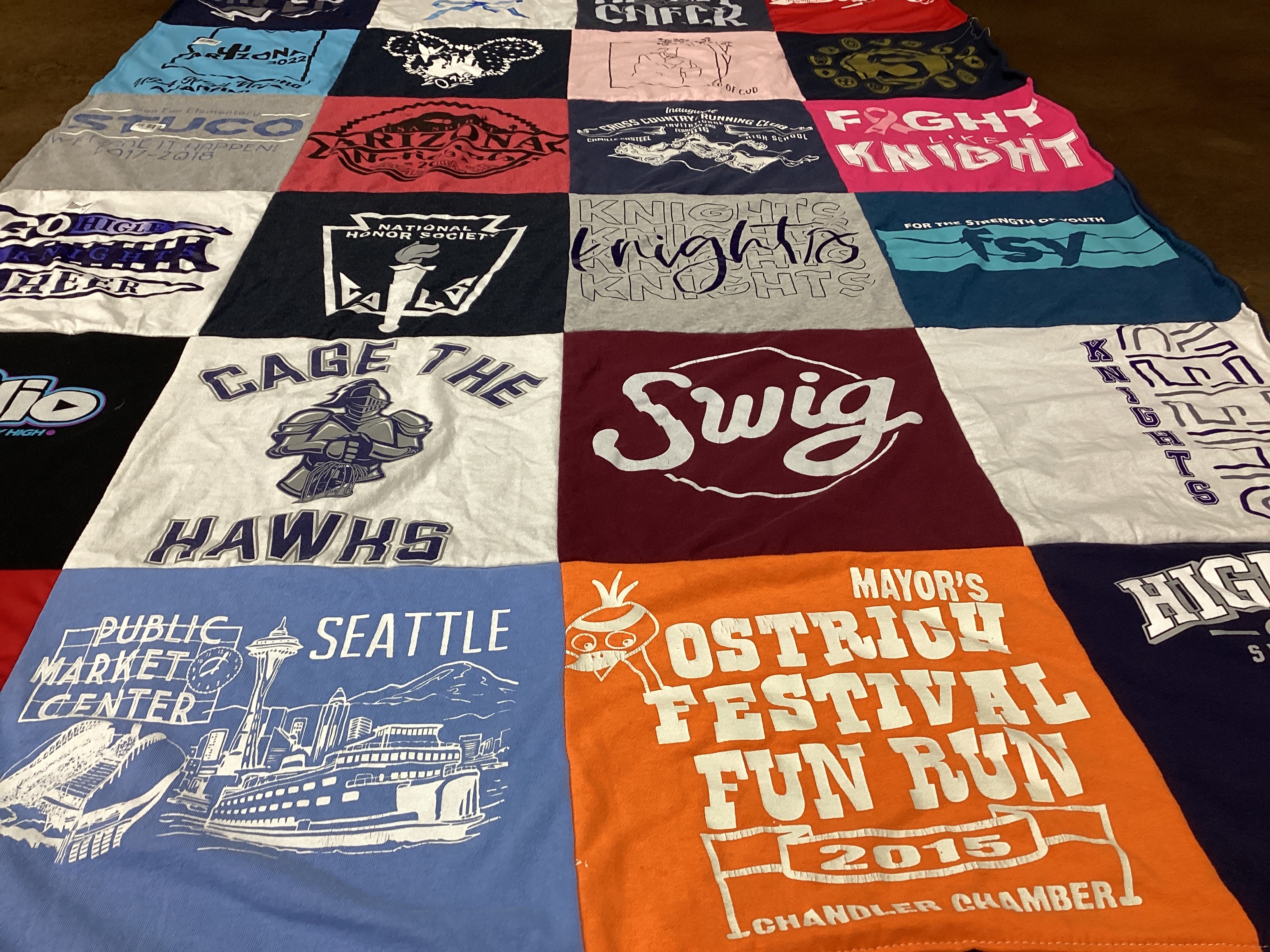 T-shirt quilt with sports, running themes by Sarah from AZ