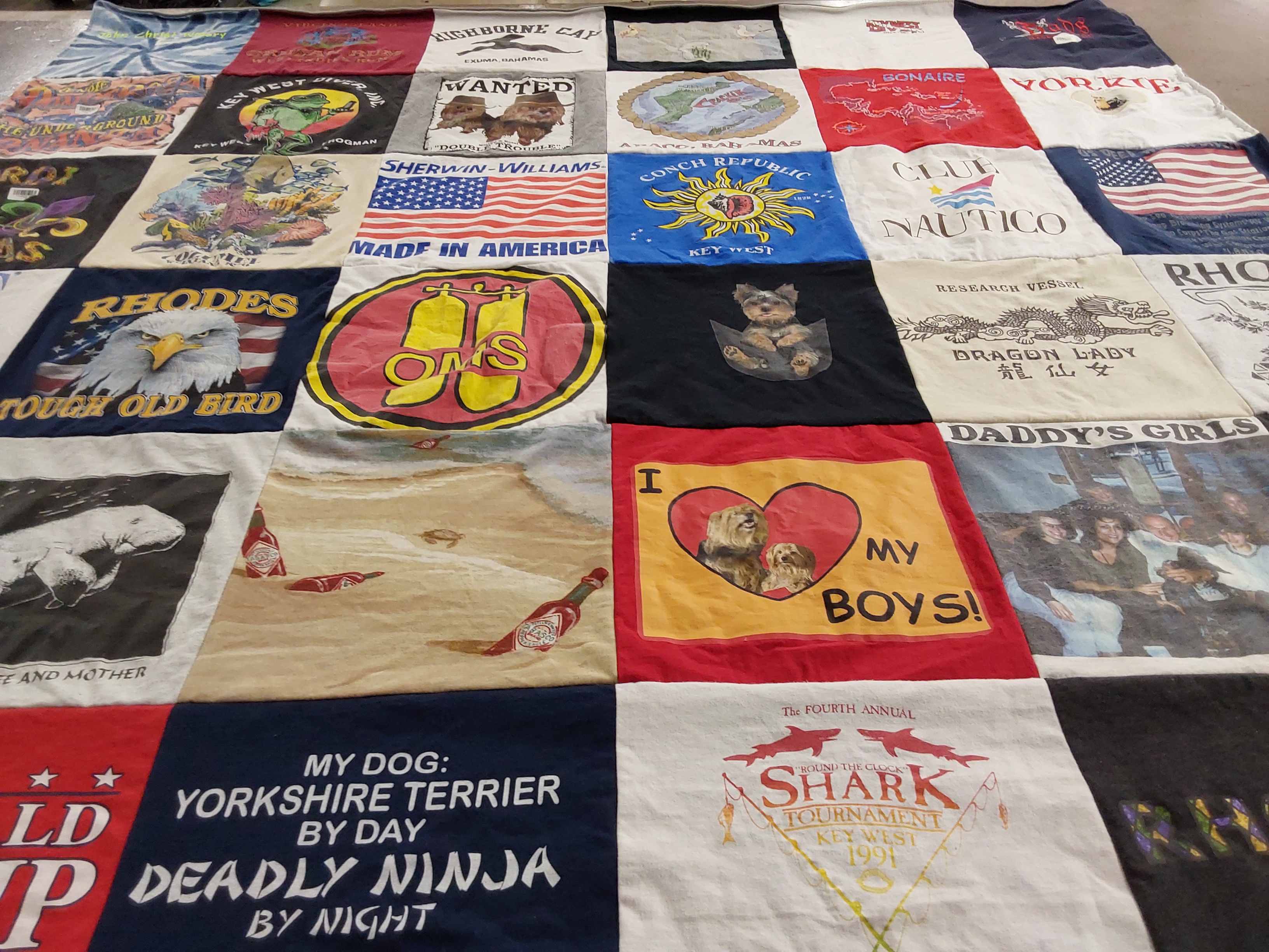 T-shirt quilt with dogs, sharks themes by Carl from OH