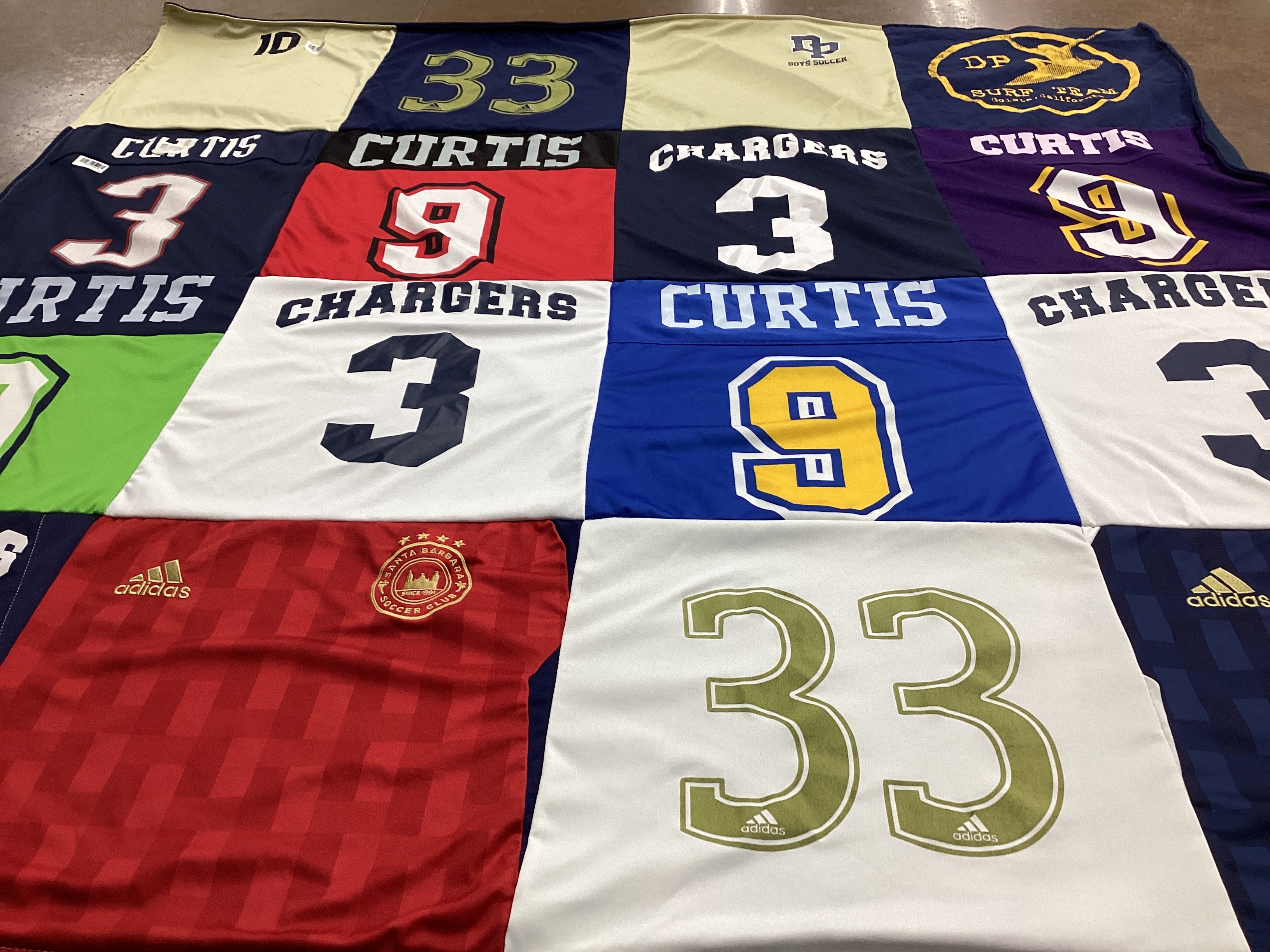 T-shirt quilt with sports, soccer themes by Shannon from CA