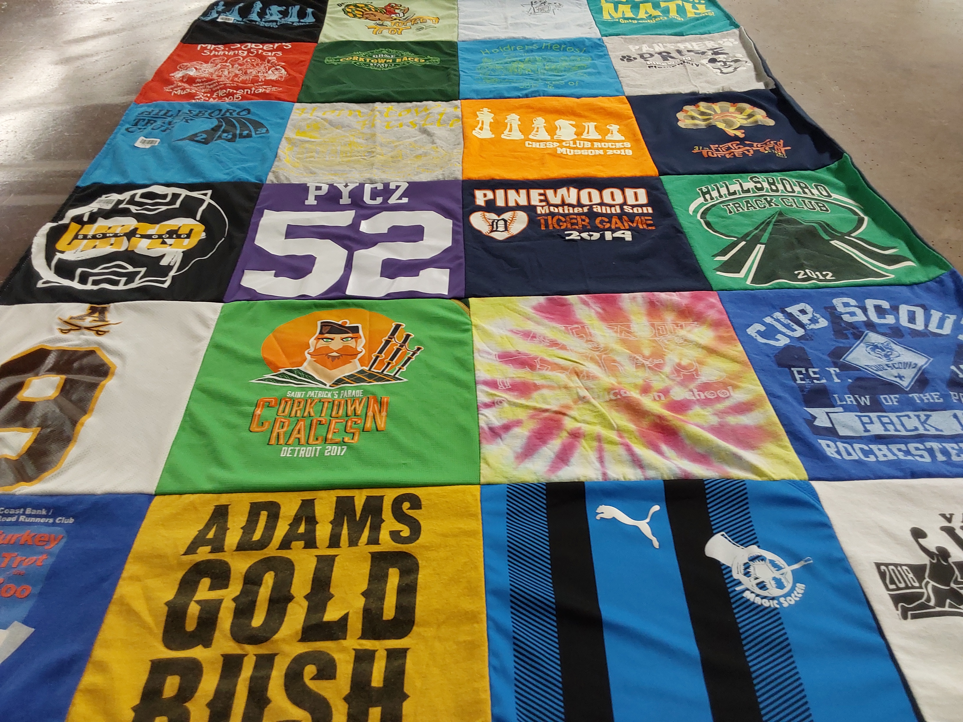 T-shirt quilt featuring hillbilly track club by Laura from MI