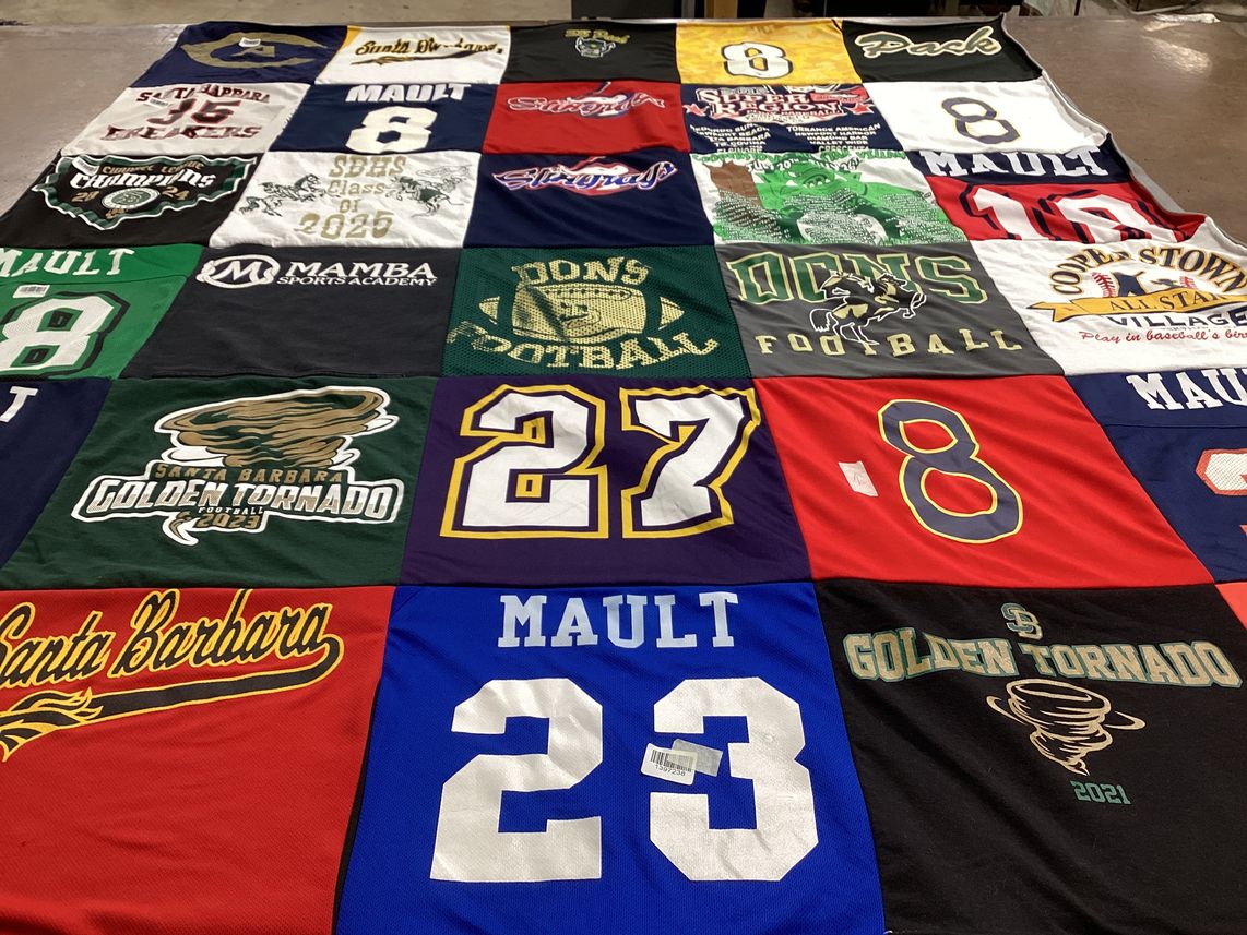 T-shirt quilt featuring golden tornado football by Lindsey from CA