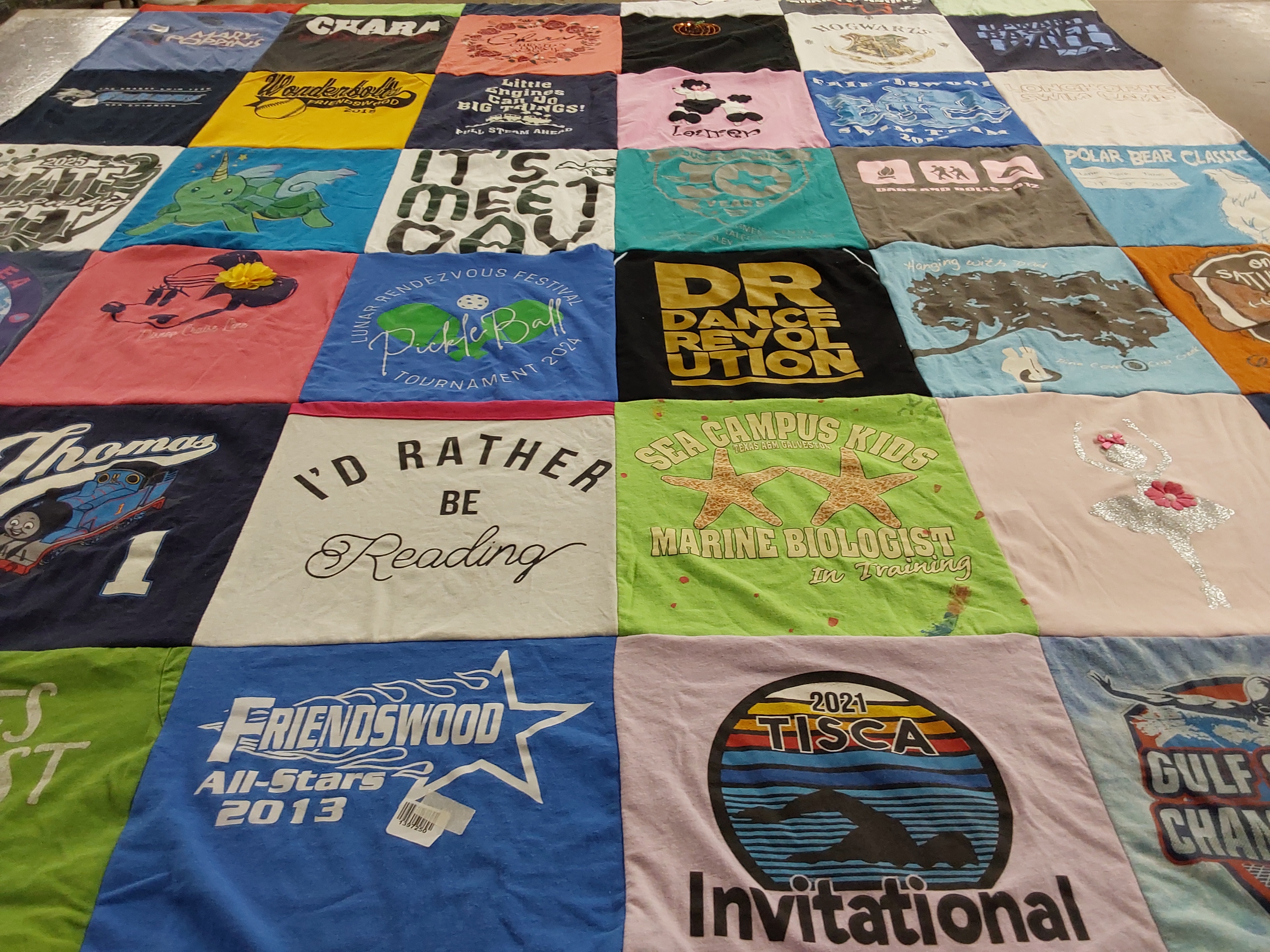 T-shirt quilt with reading, dance themes by jennifer from TX