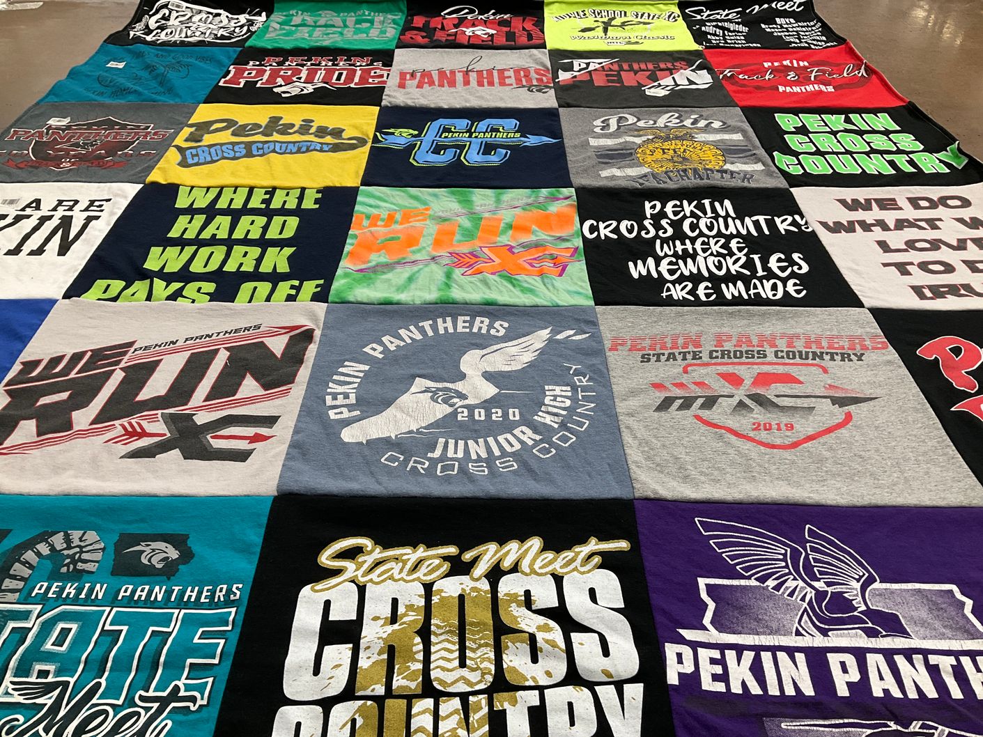 T-shirt quilt featuring pekin panthers cross country team by Luyre from IA