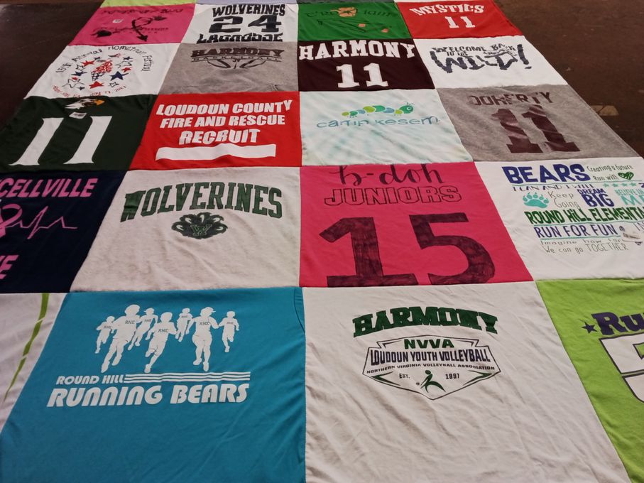 T-shirt quilt featuring round hill running bears, harmony wolverines by Kate from VA