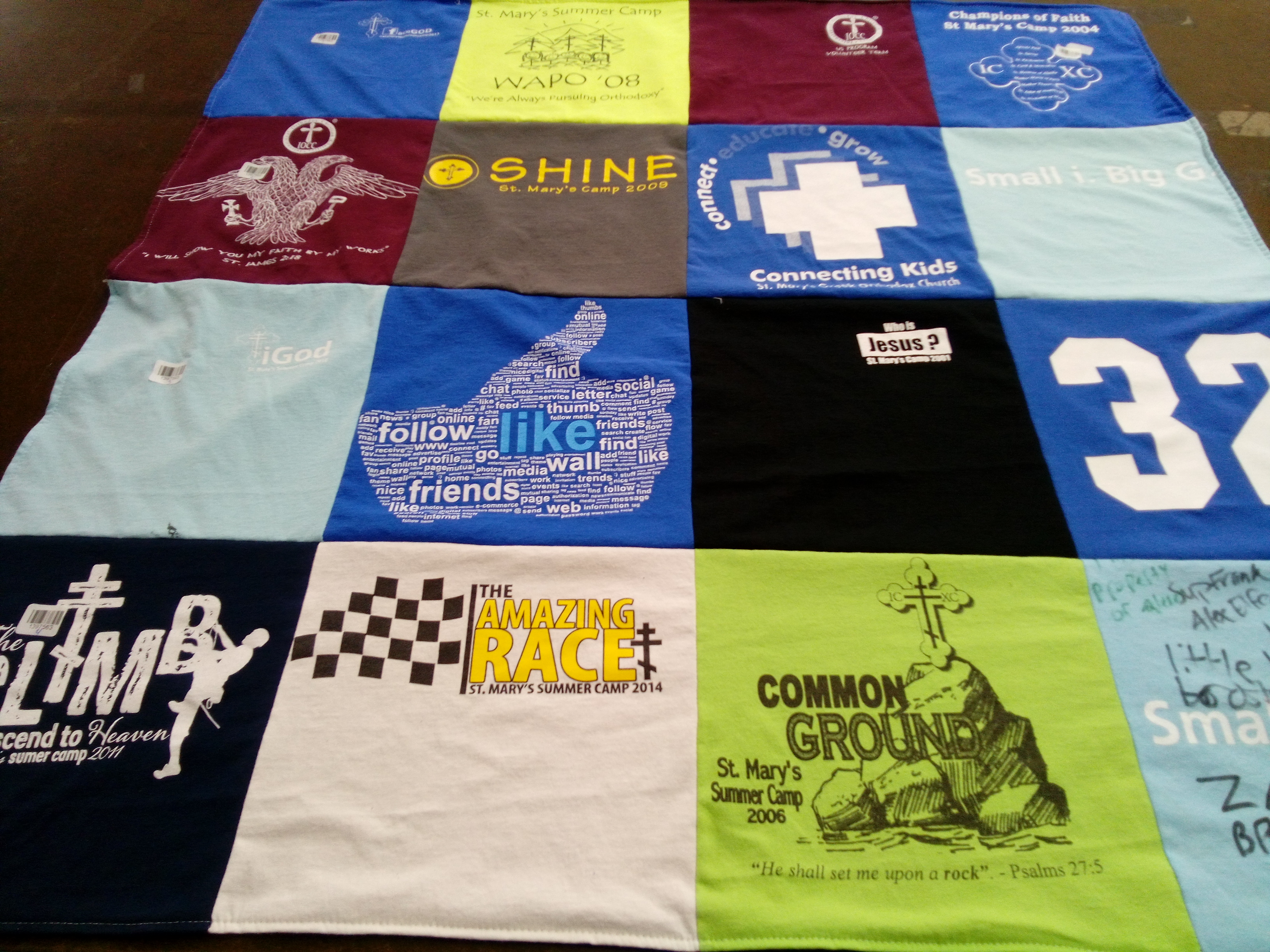 T-shirt quilt with camping, community themes by Kathy from MN