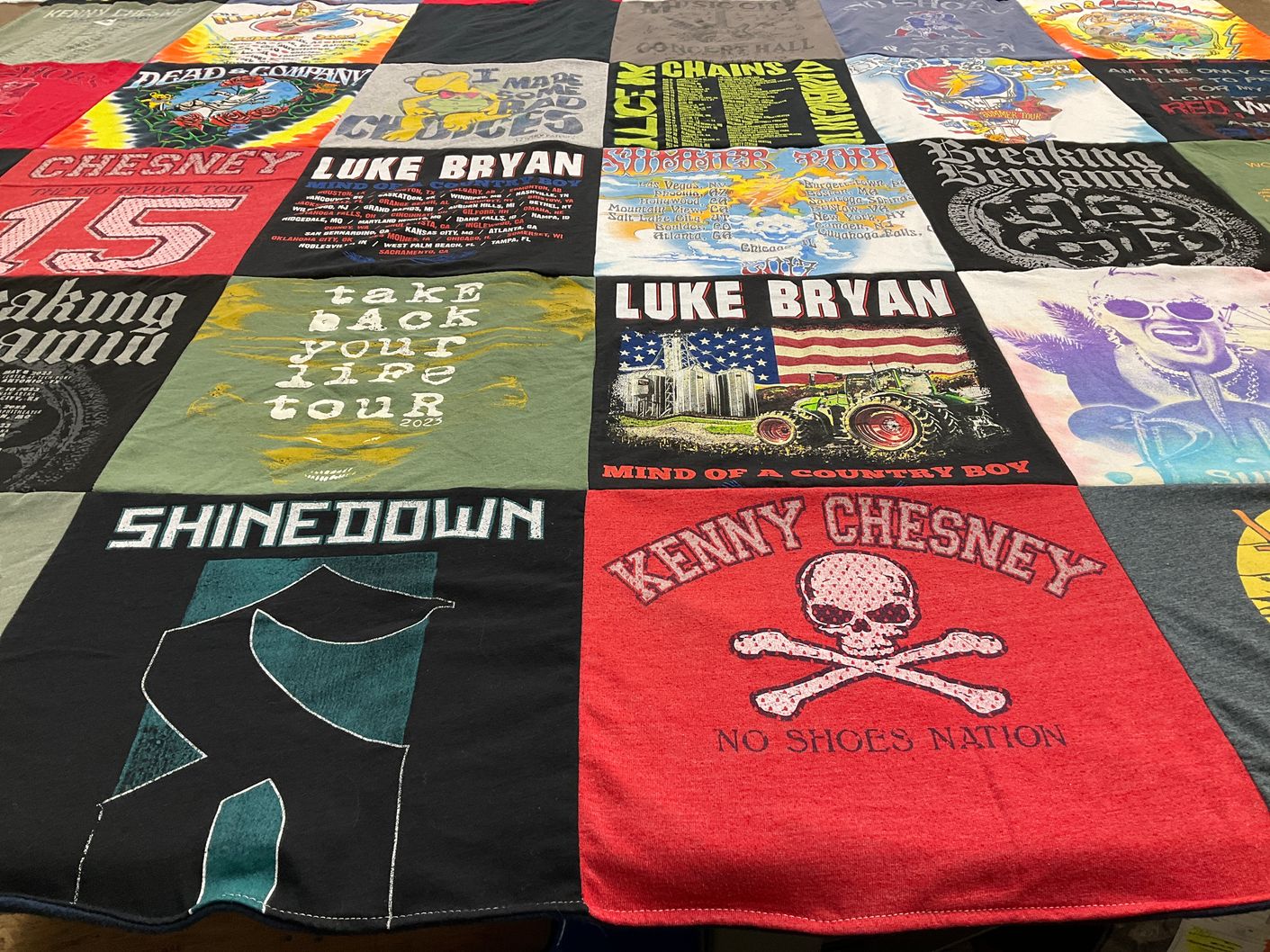 T-shirt quilt with country music, rock music themes by Tracy from NH