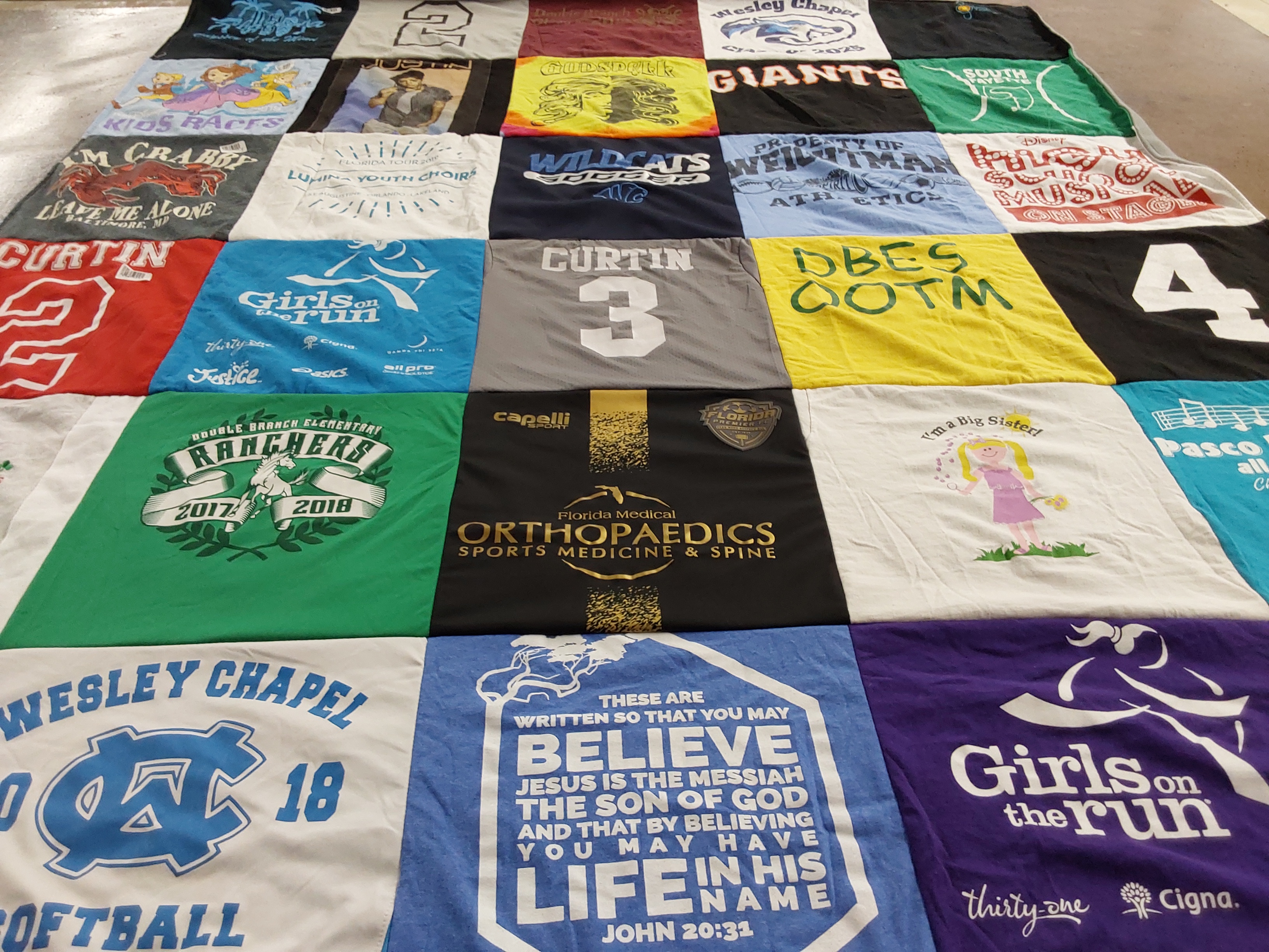 T-shirt quilt featuring double branch rangers, wesley chapel wildcats by Kristina from FL